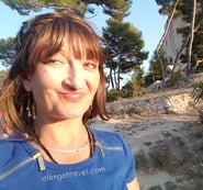 Alonga travel the author in Dubrovnik smiling happily about being there