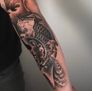 japanese koi fish tattoo on the arm kaunas lithuania