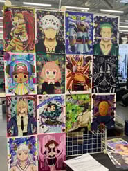 Stand marchés de noël decathlon metz 2022, stand petite plume illustrations manga