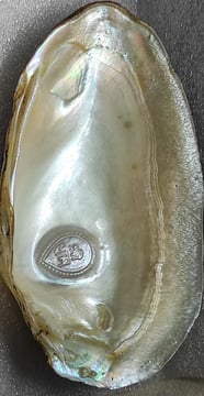 "11mm white designer cultured pearl with a divine face motif–crafted using nucleus technique-for global buyers"