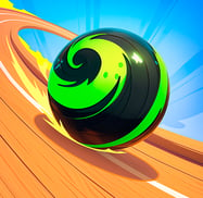 a ball with a green ball on a wooden floor