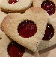 a plate of cookies and jelly jellys on a plate
