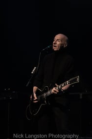 Midge Ure - live at Chepstow Castle - guitar and dark background - Music in Wales - Nick Langston