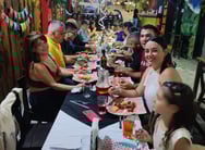 clientes felices en candelabro parrila
