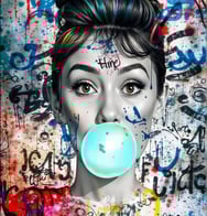 Audrey Hedpburh with a bubblegum