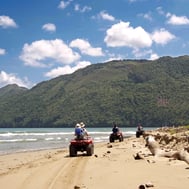 ATV beach adventure in the Dominican Republic with ocean and mountain views