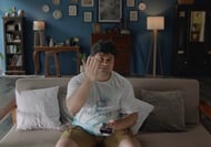Big Basket, Cricket, Aditya Satyajit, One for Love, Ad, Man sitting on a couch  watching Cricket