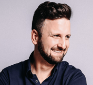 a man with a beard and a beard