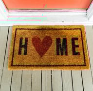 welcome mat that says home