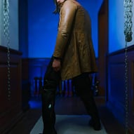 FTSH Studios model (s) Oscar Thickk UK Fetish Model wearing leather jacket and rubber boots