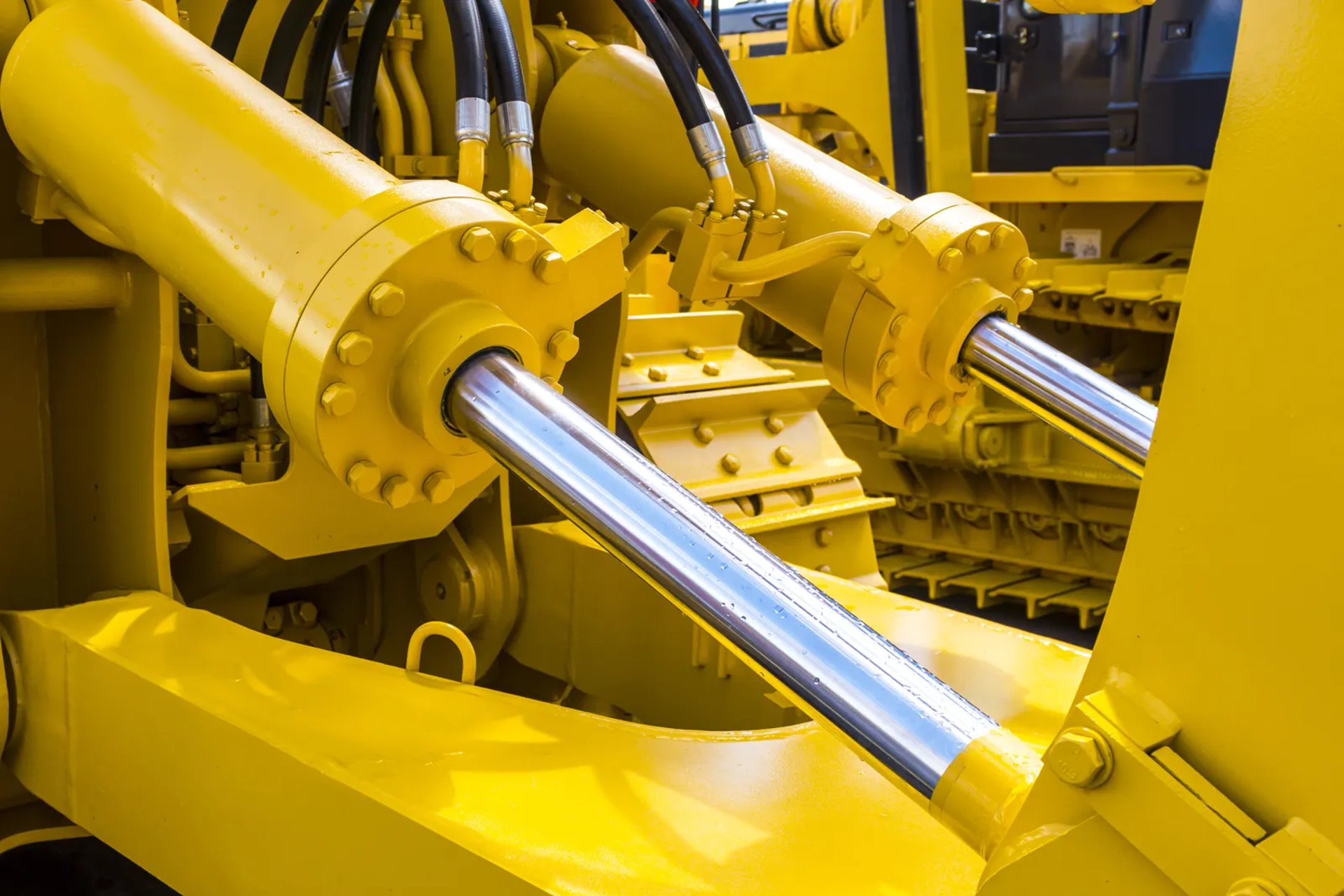 big-hydraulic-yellow-tubes
