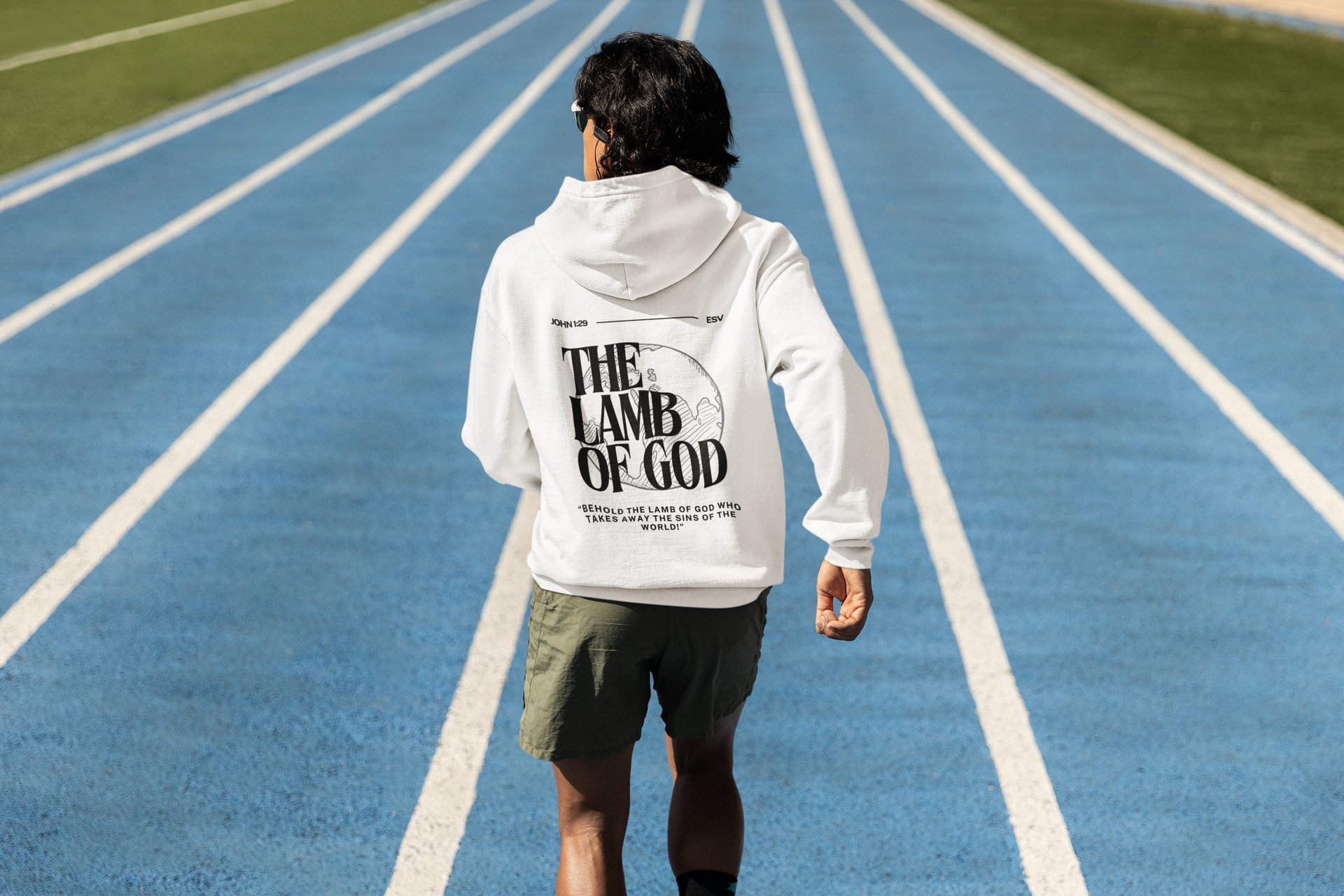 an abstract photo of a curved building with a blue sky in the background