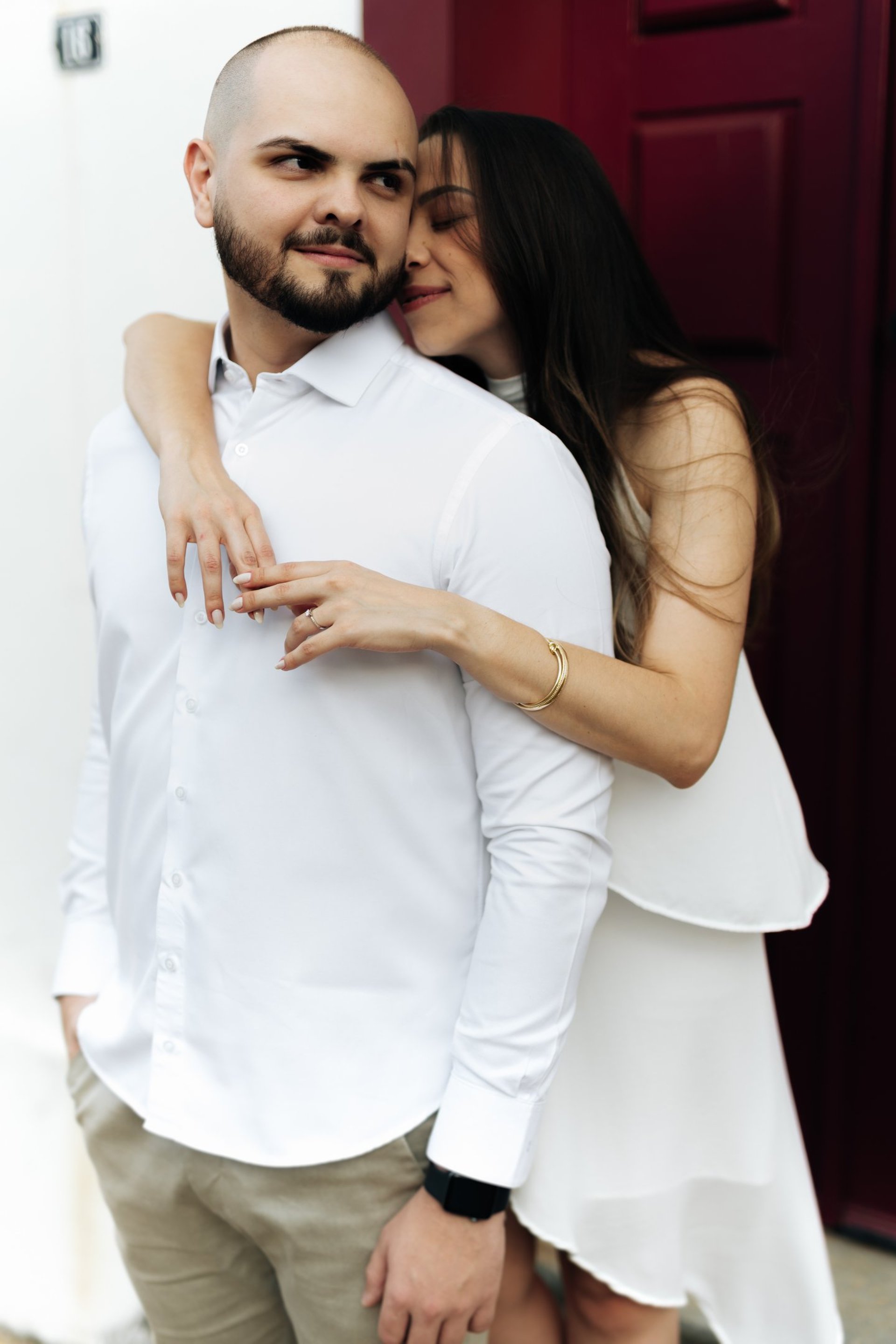 couple wearing silver-colored rings