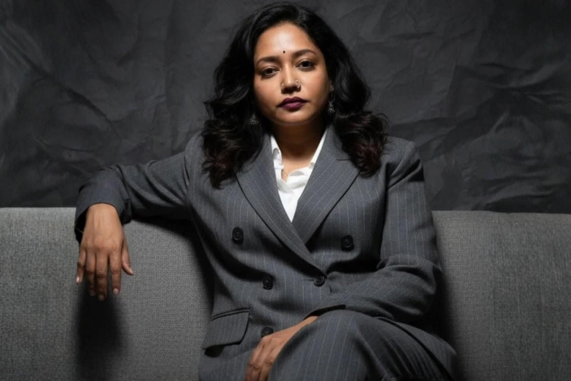 black and brown leather padded tub sofa