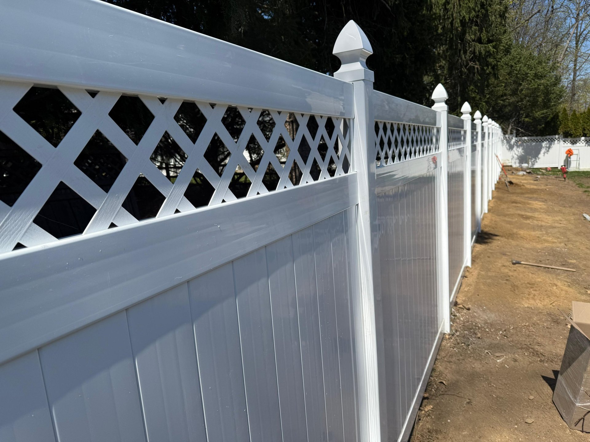 person riding on skis during winter surrounded by mountains