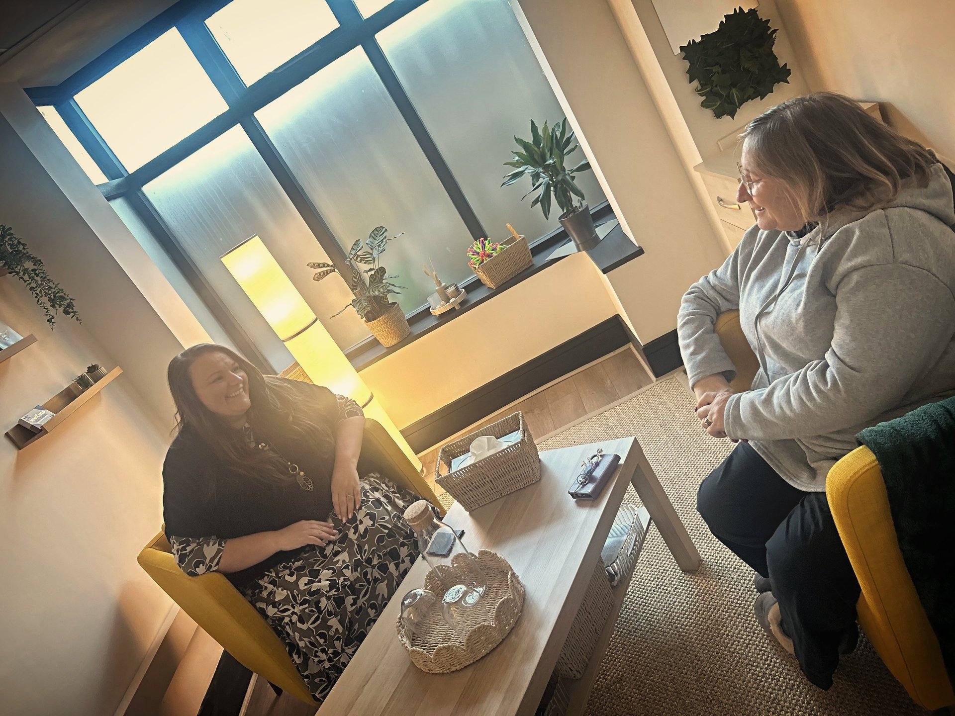 woman wearing yellow long-sleeved dress under white clouds and blue sky during daytime