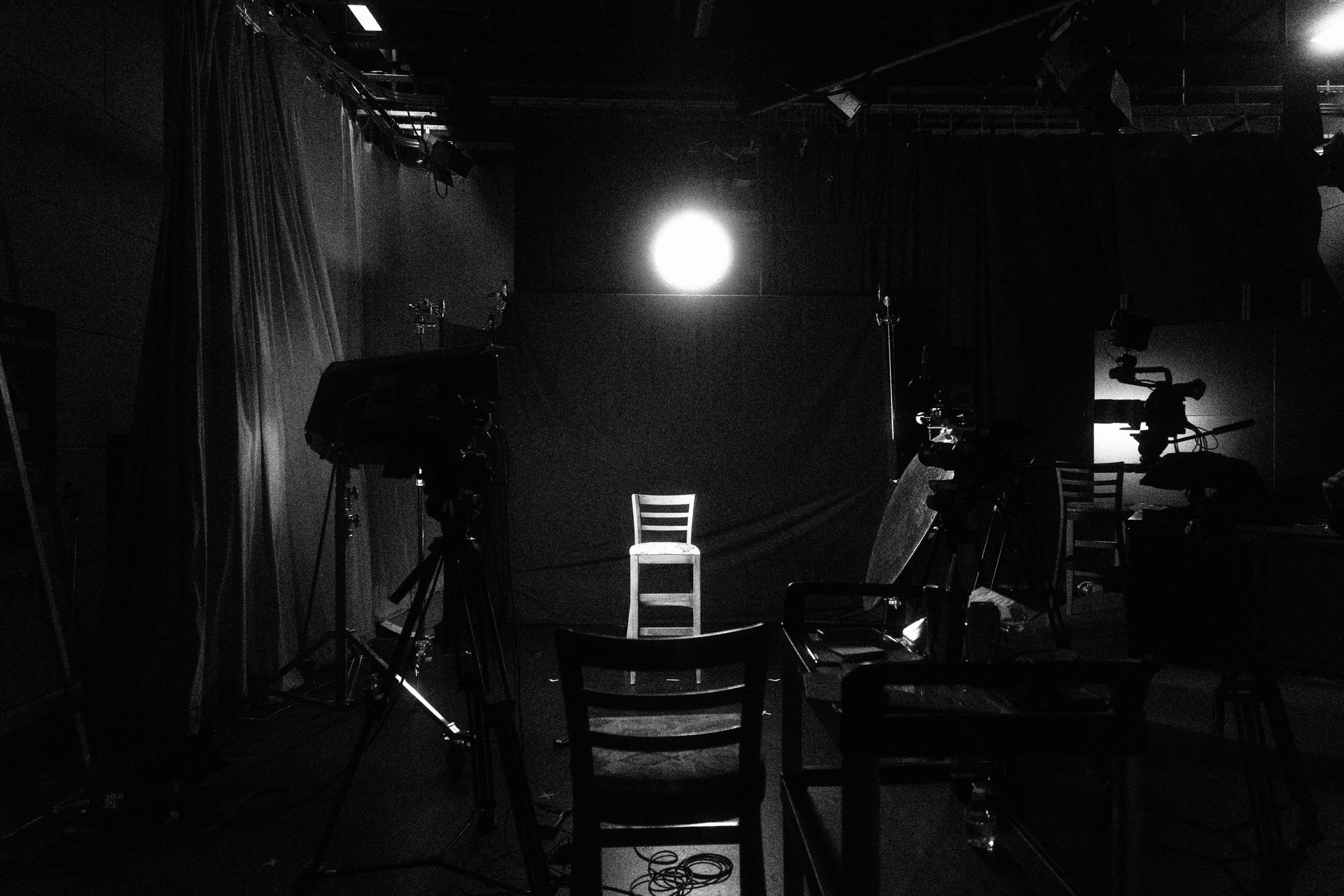 black and brown leather padded tub sofa