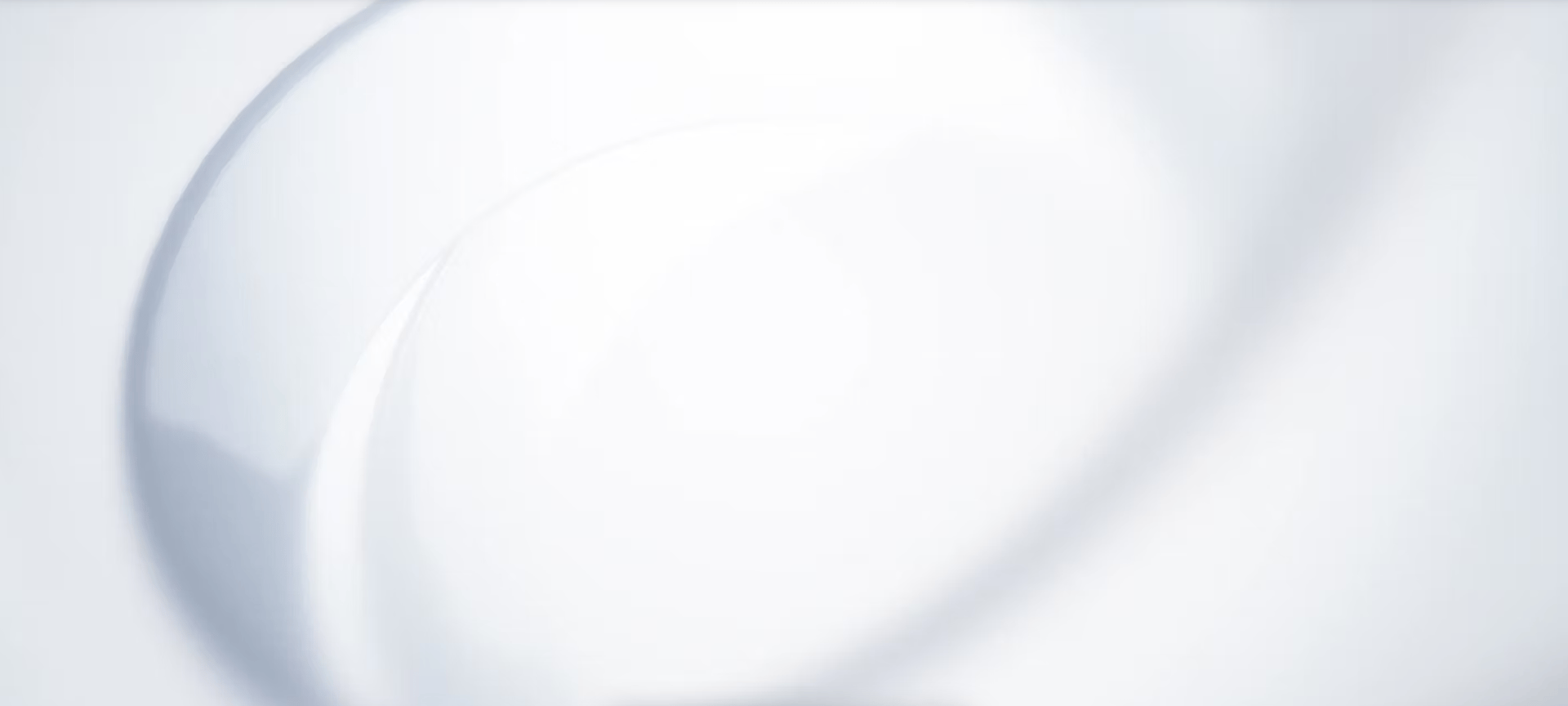 a black and white photo of a white wall