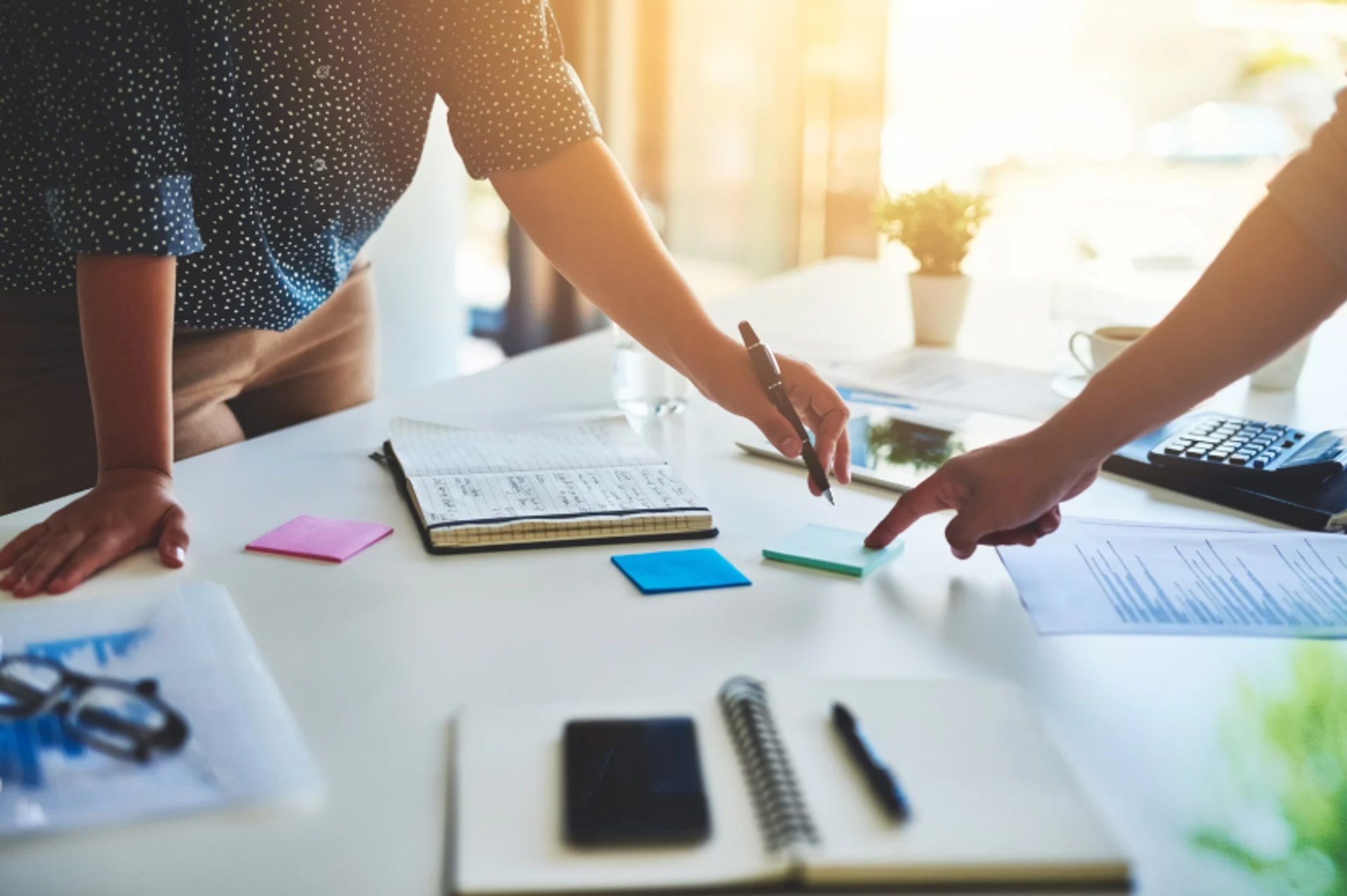 an abstract photo of a curved building with a blue sky in the background
