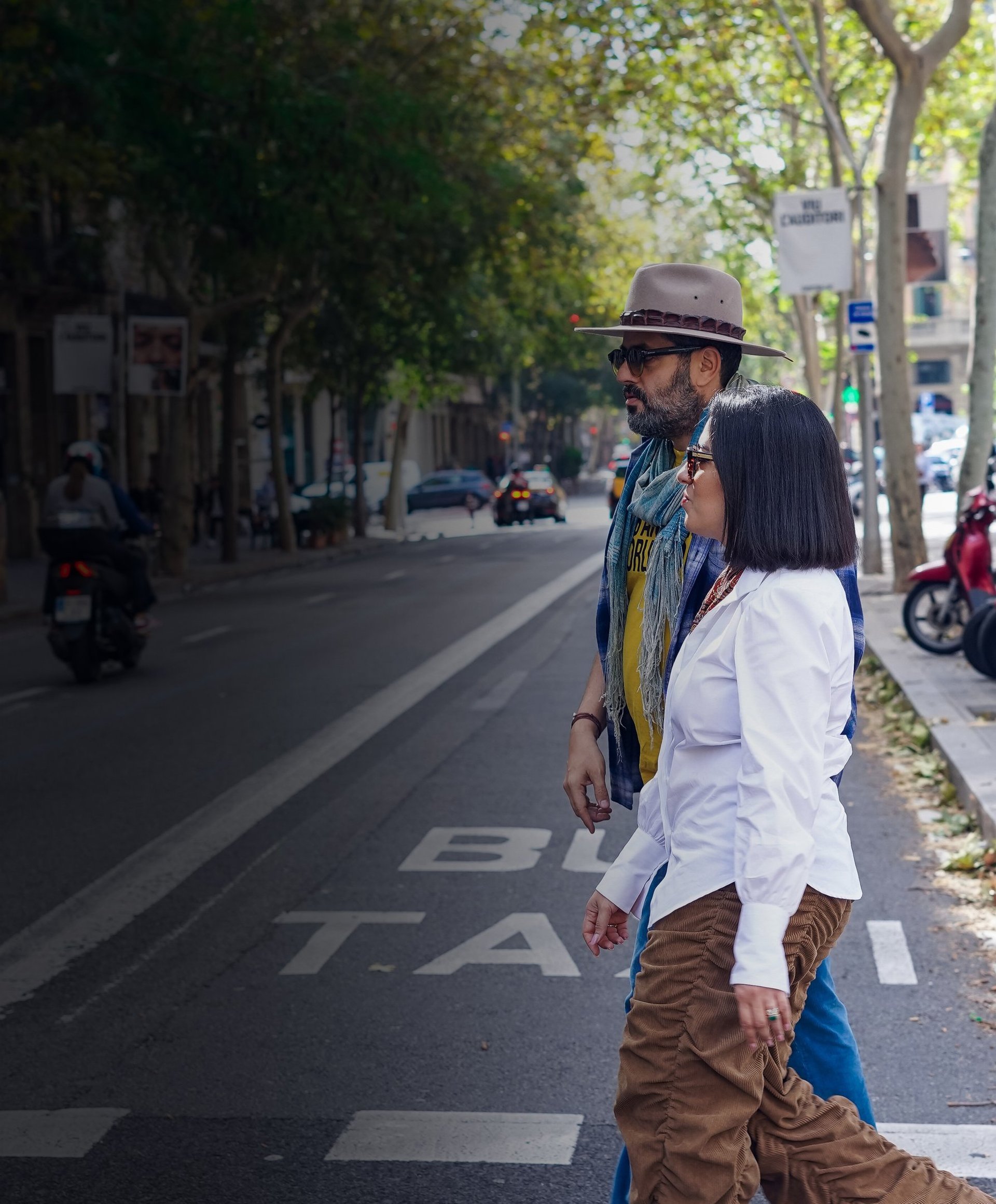 an abstract photo of a curved building with a blue sky in the background