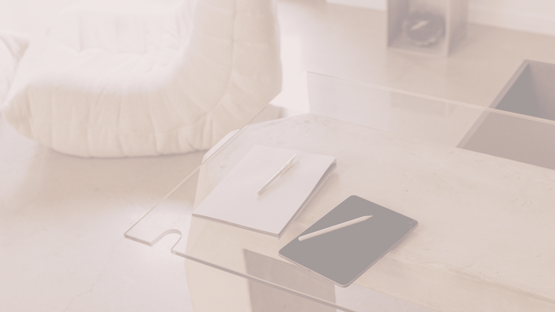 MacBook Pro on table beside white iMac and Magic Mouse