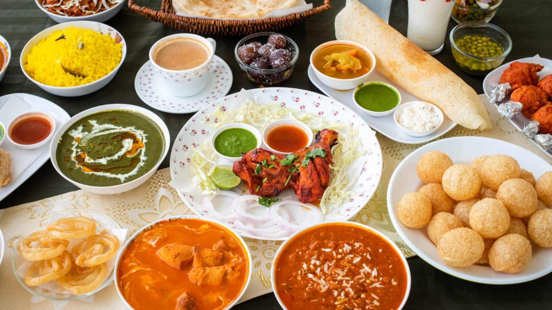 woman wearing yellow long-sleeved dress under white clouds and blue sky during daytime