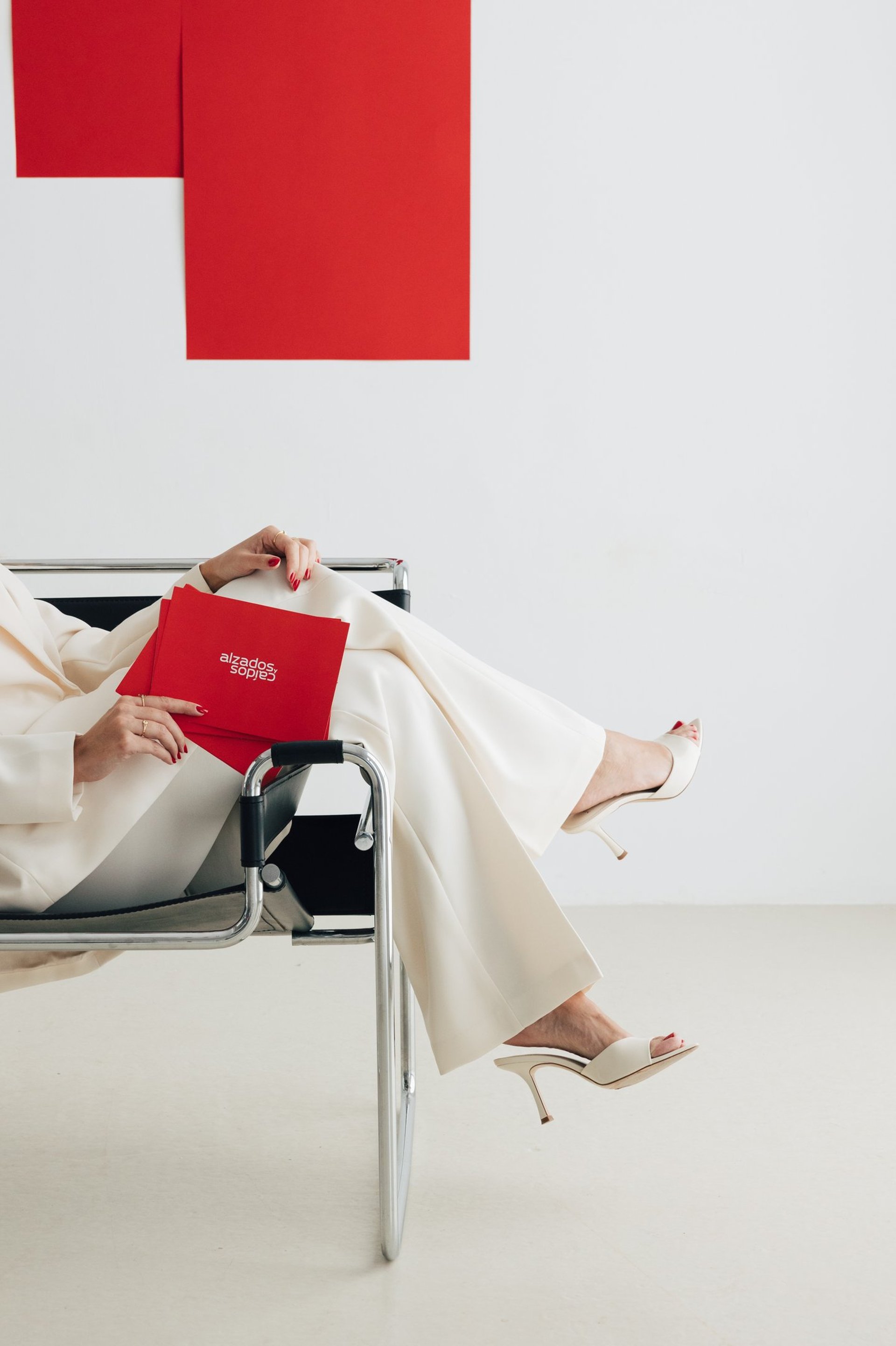 an abstract photo of a curved building with a blue sky in the background