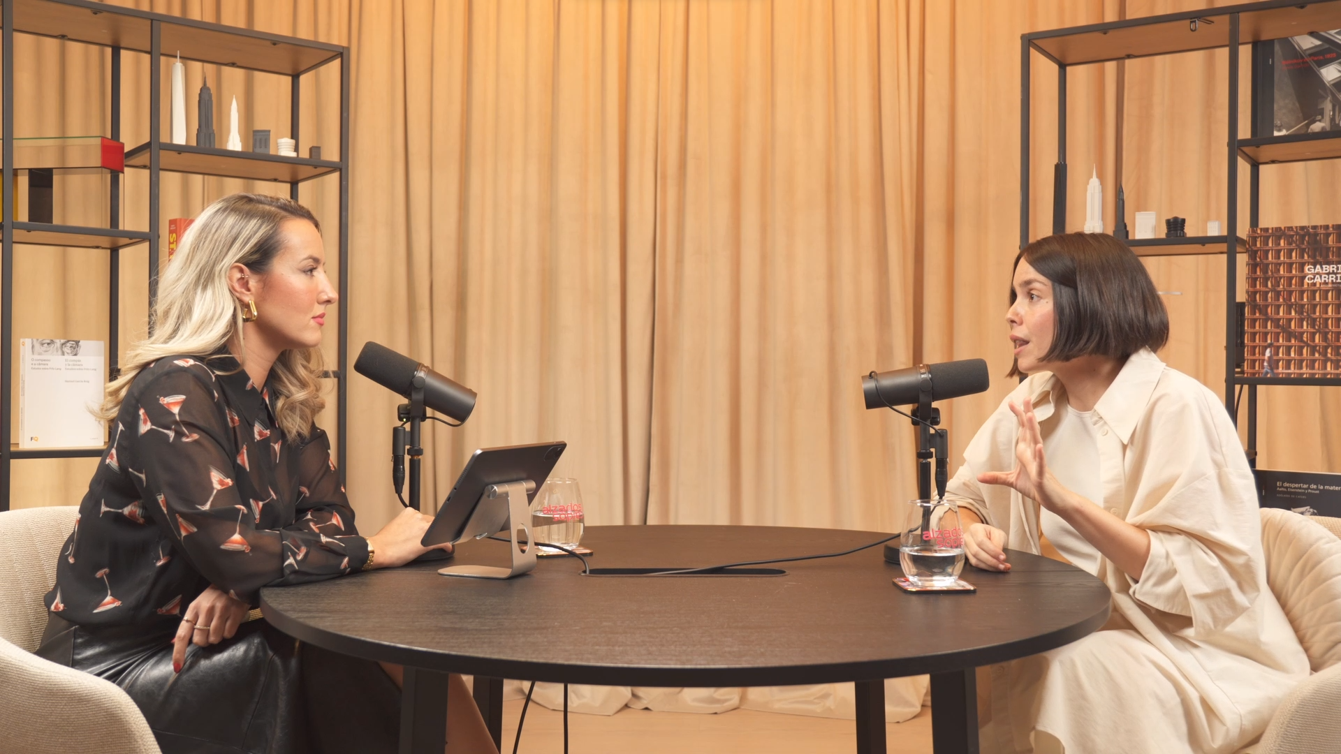 an abstract photo of a curved building with a blue sky in the background