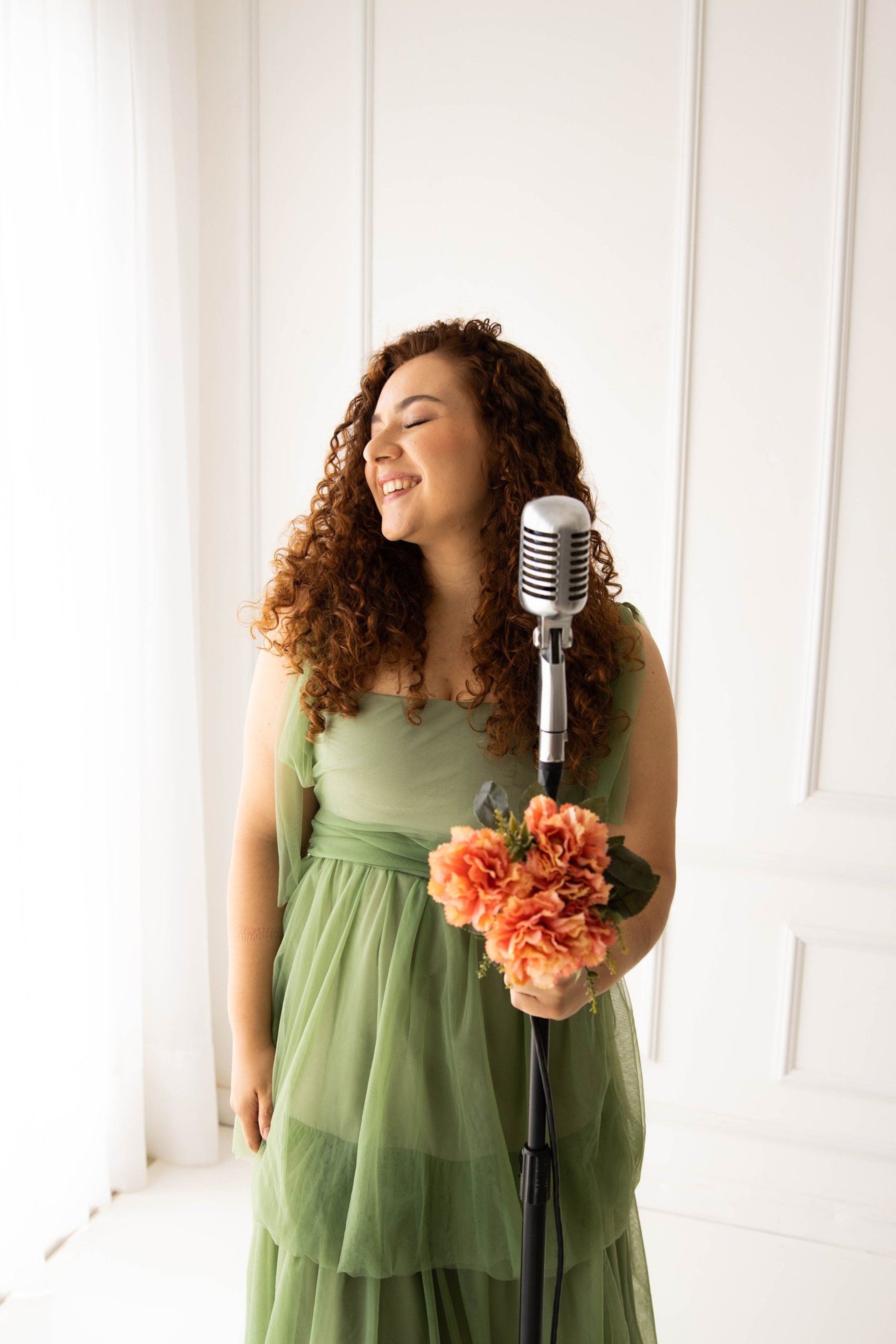 woman wearing yellow long-sleeved dress under white clouds and blue sky during daytime