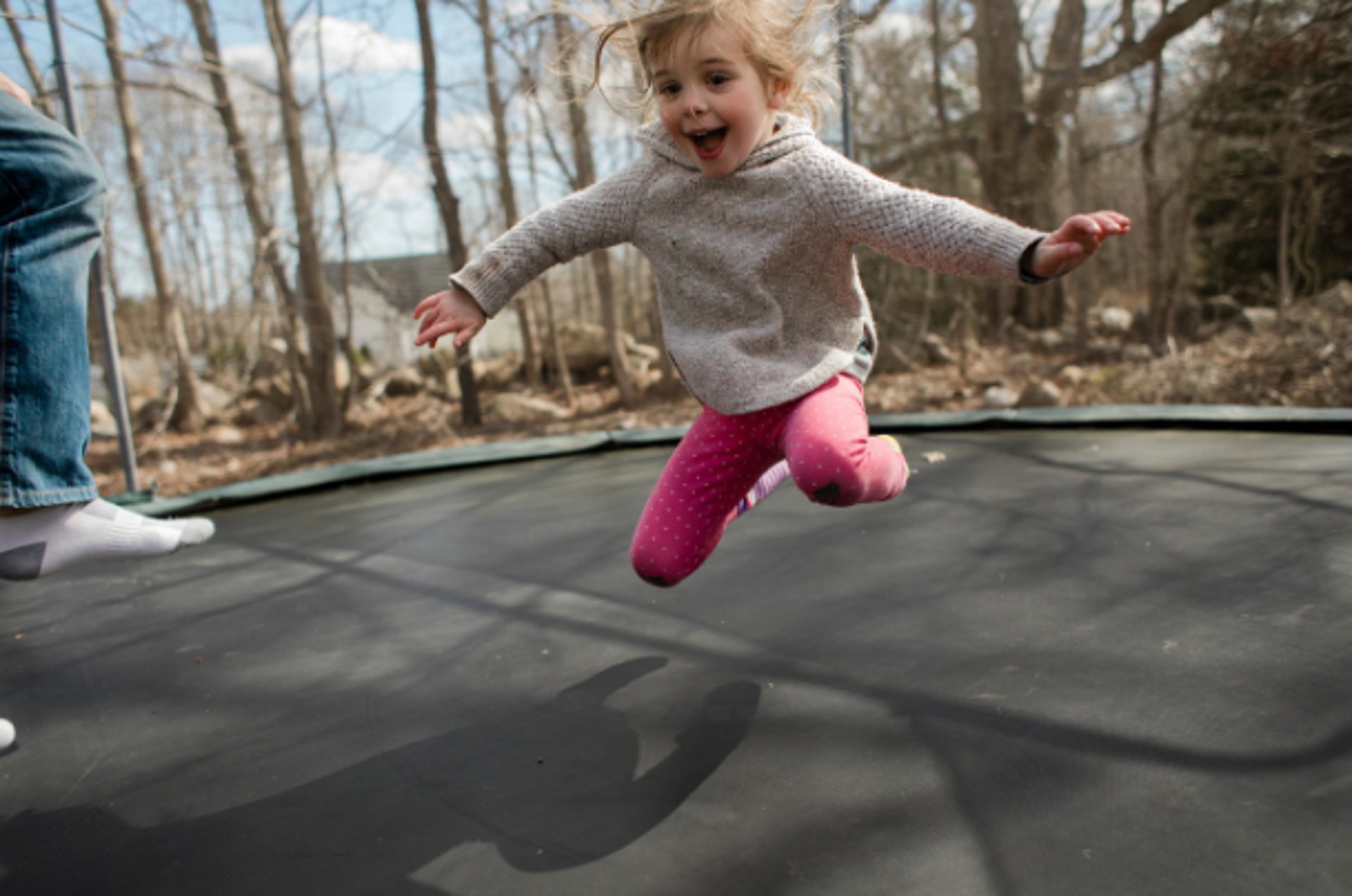 man and woman standing in front of brown concrete building during daytime