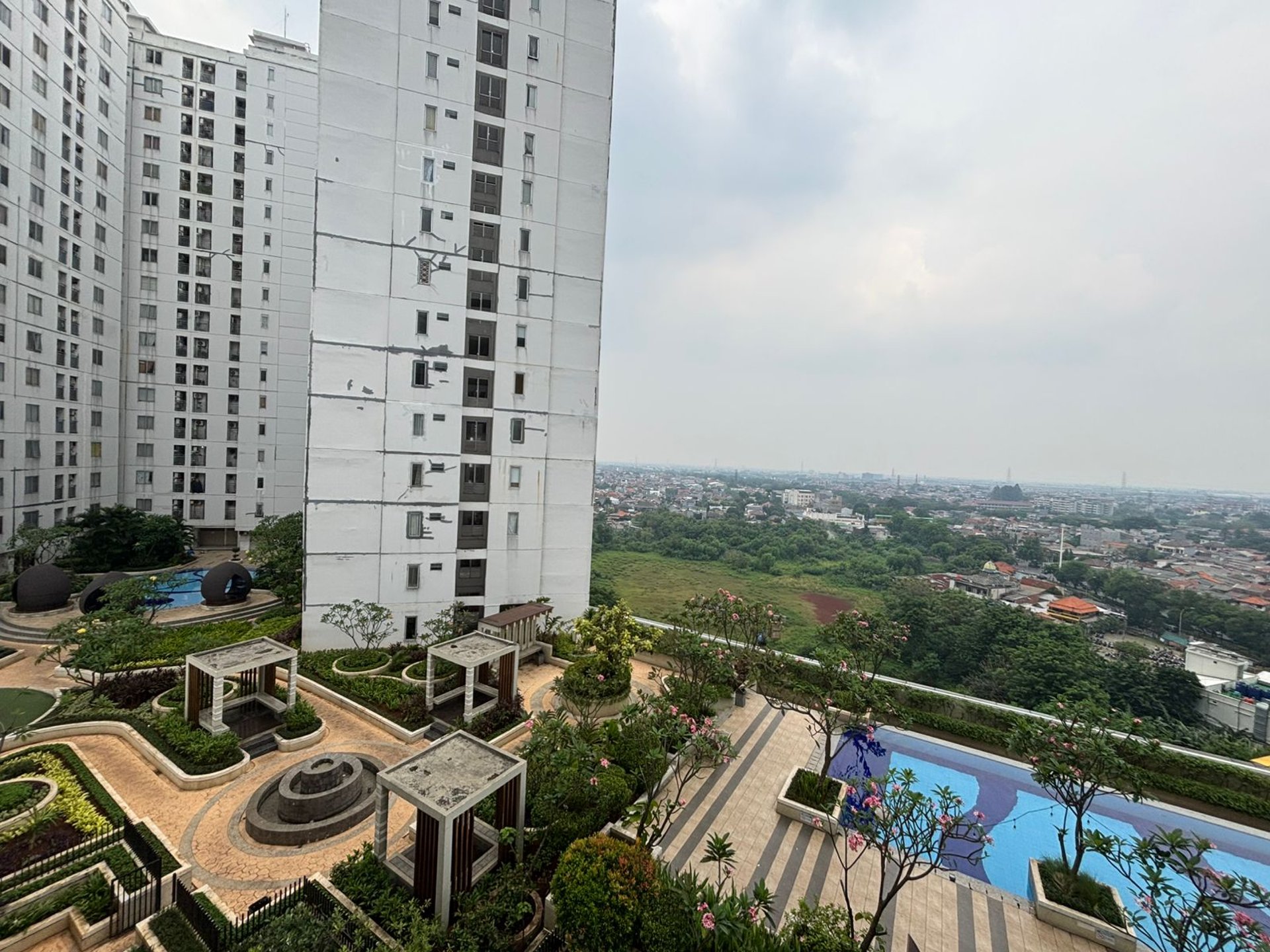 woman wearing yellow long-sleeved dress under white clouds and blue sky during daytime