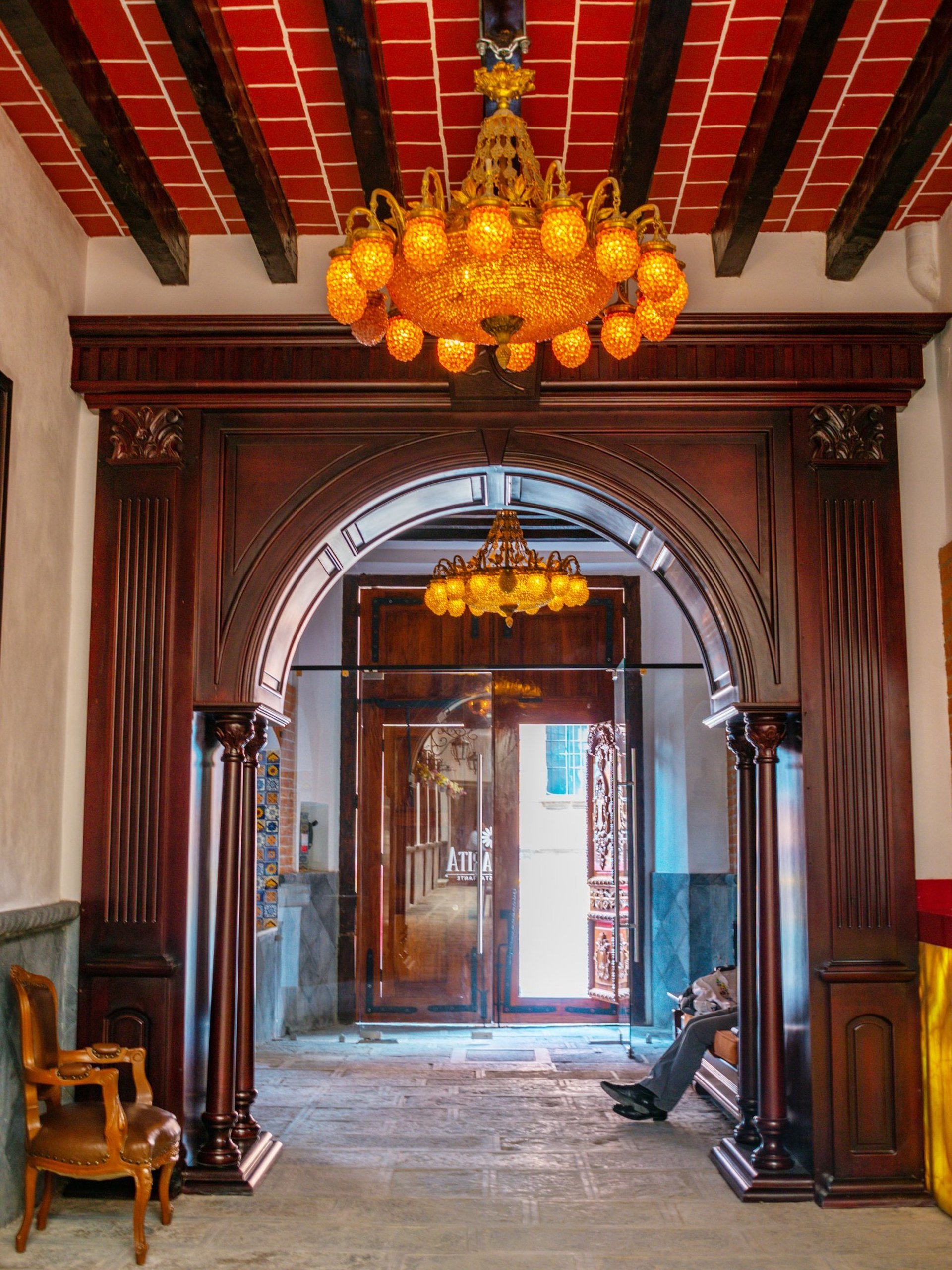 woman wearing yellow long-sleeved dress under white clouds and blue sky during daytime