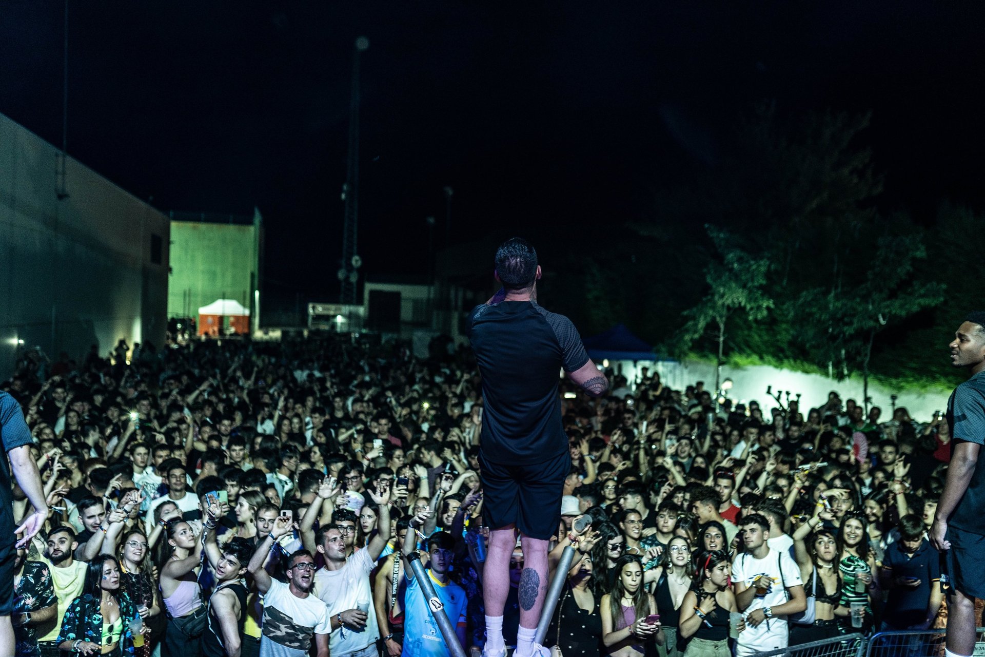 an abstract photo of a curved building with a blue sky in the background