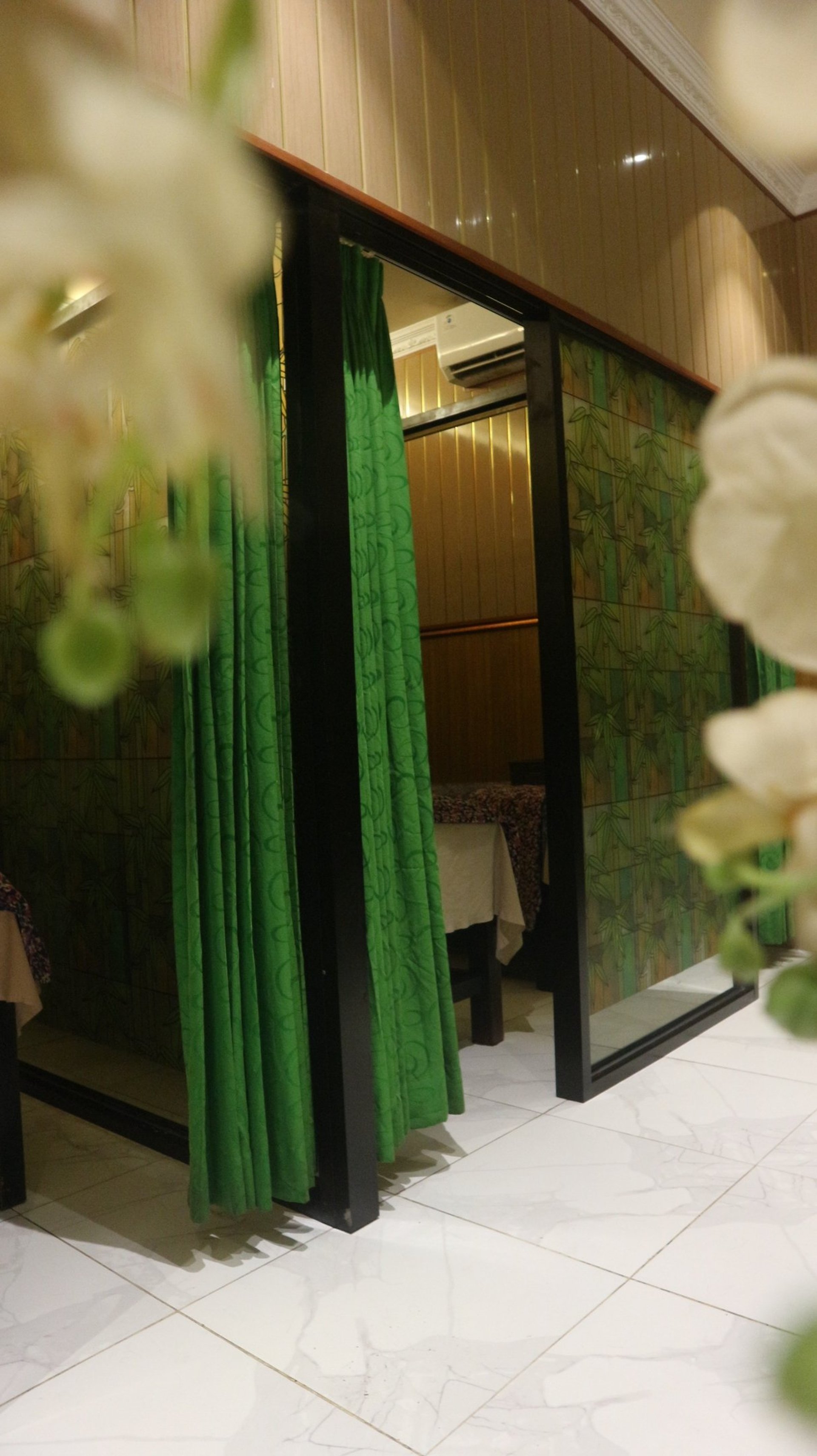 an abstract photo of a curved building with a blue sky in the background