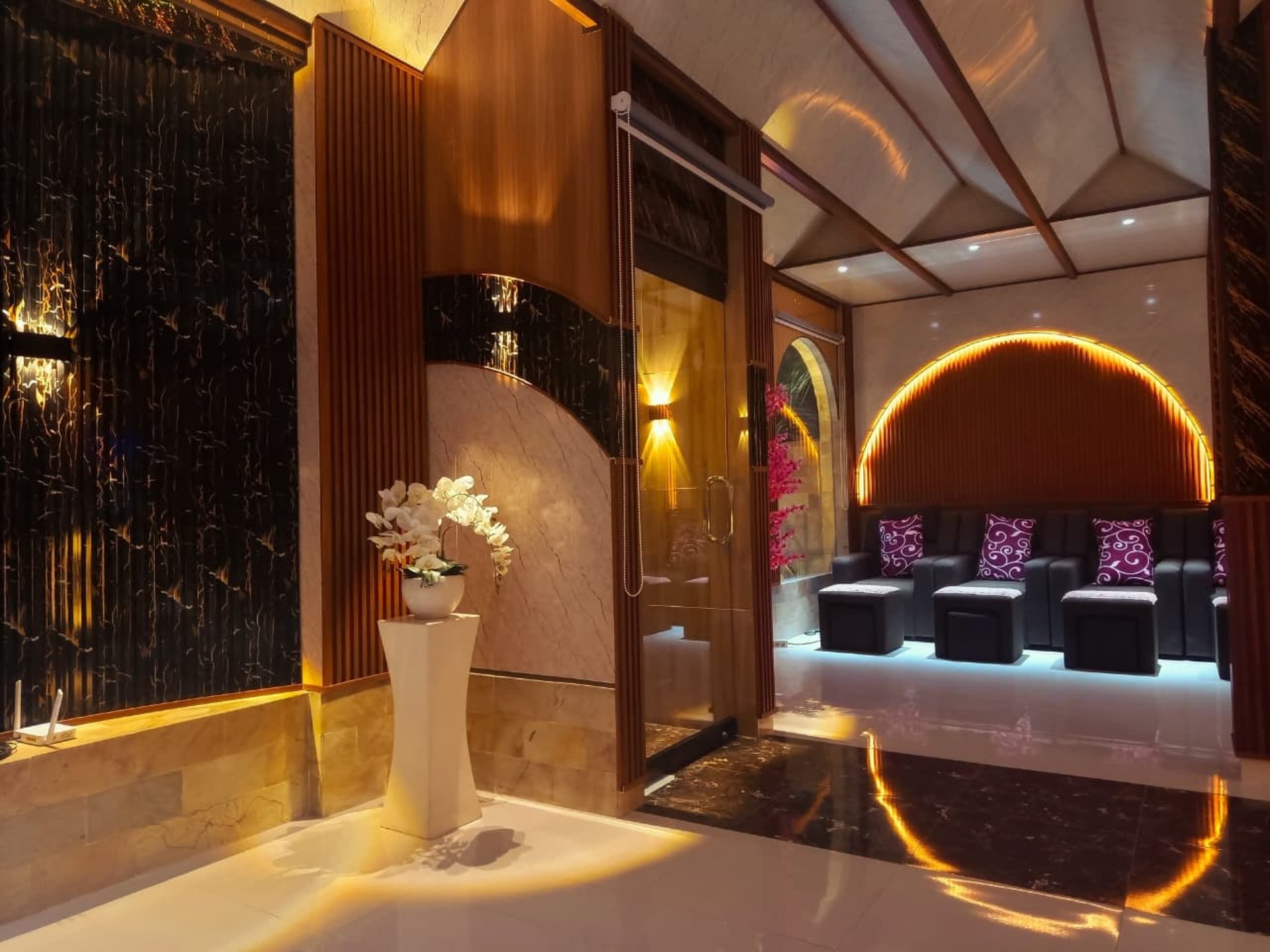 an abstract photo of a curved building with a blue sky in the background