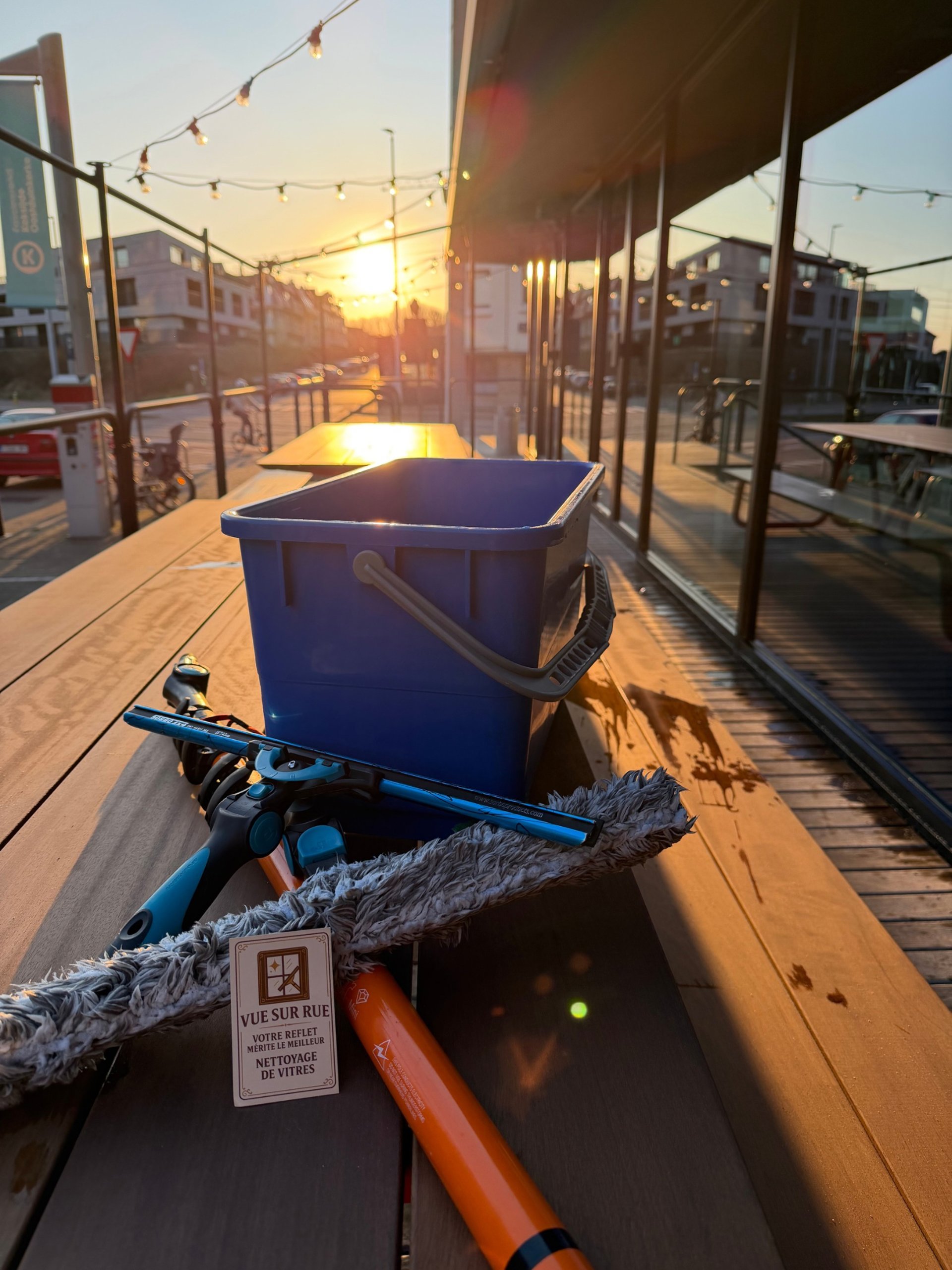 an abstract photo of a curved building with a blue sky in the background