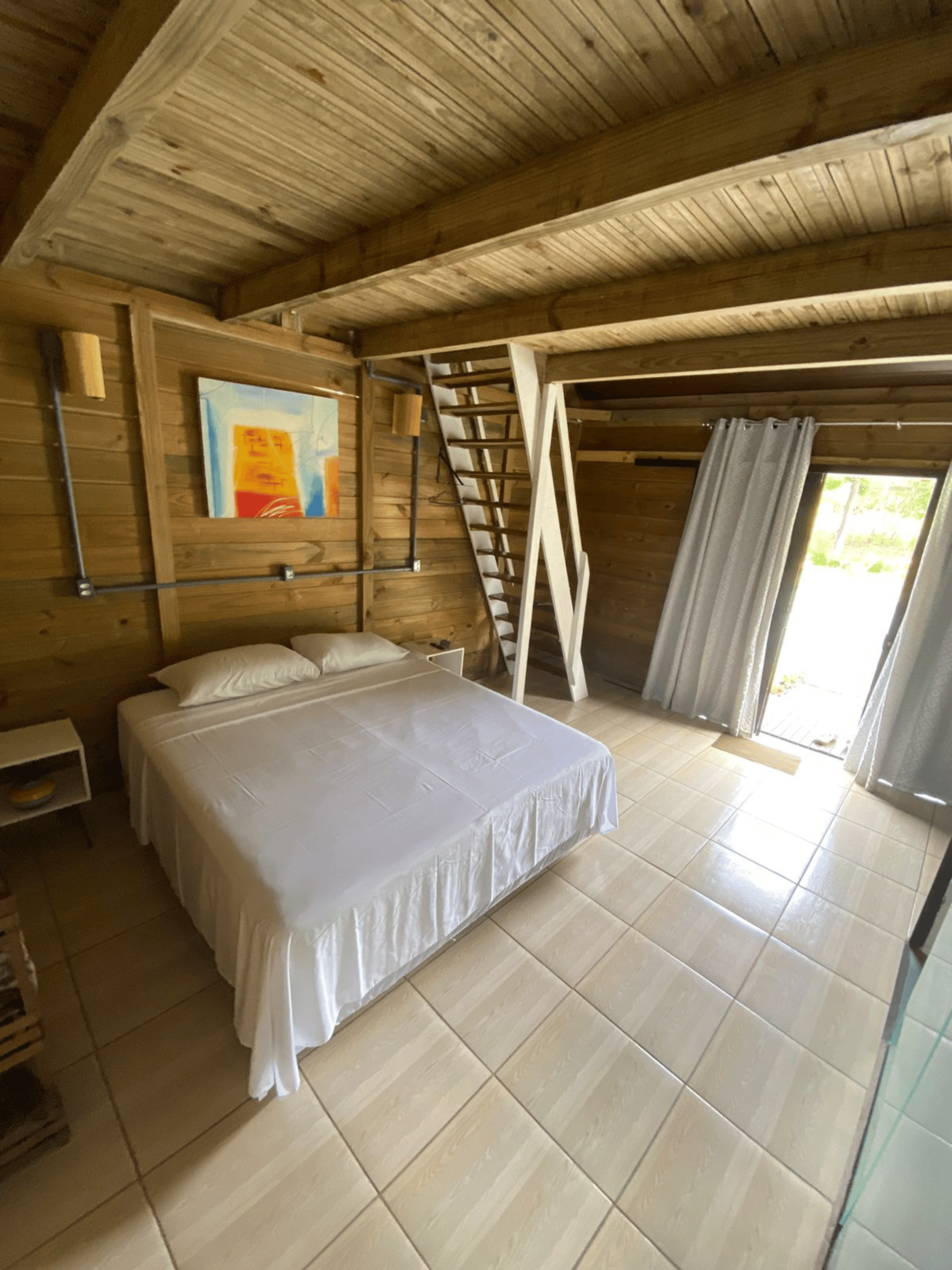 woman wearing yellow long-sleeved dress under white clouds and blue sky during daytime