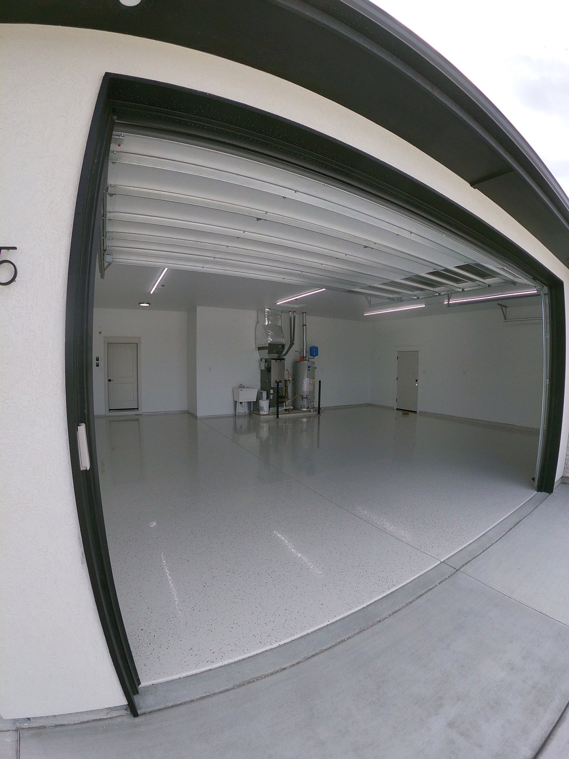 woman wearing yellow long-sleeved dress under white clouds and blue sky during daytime