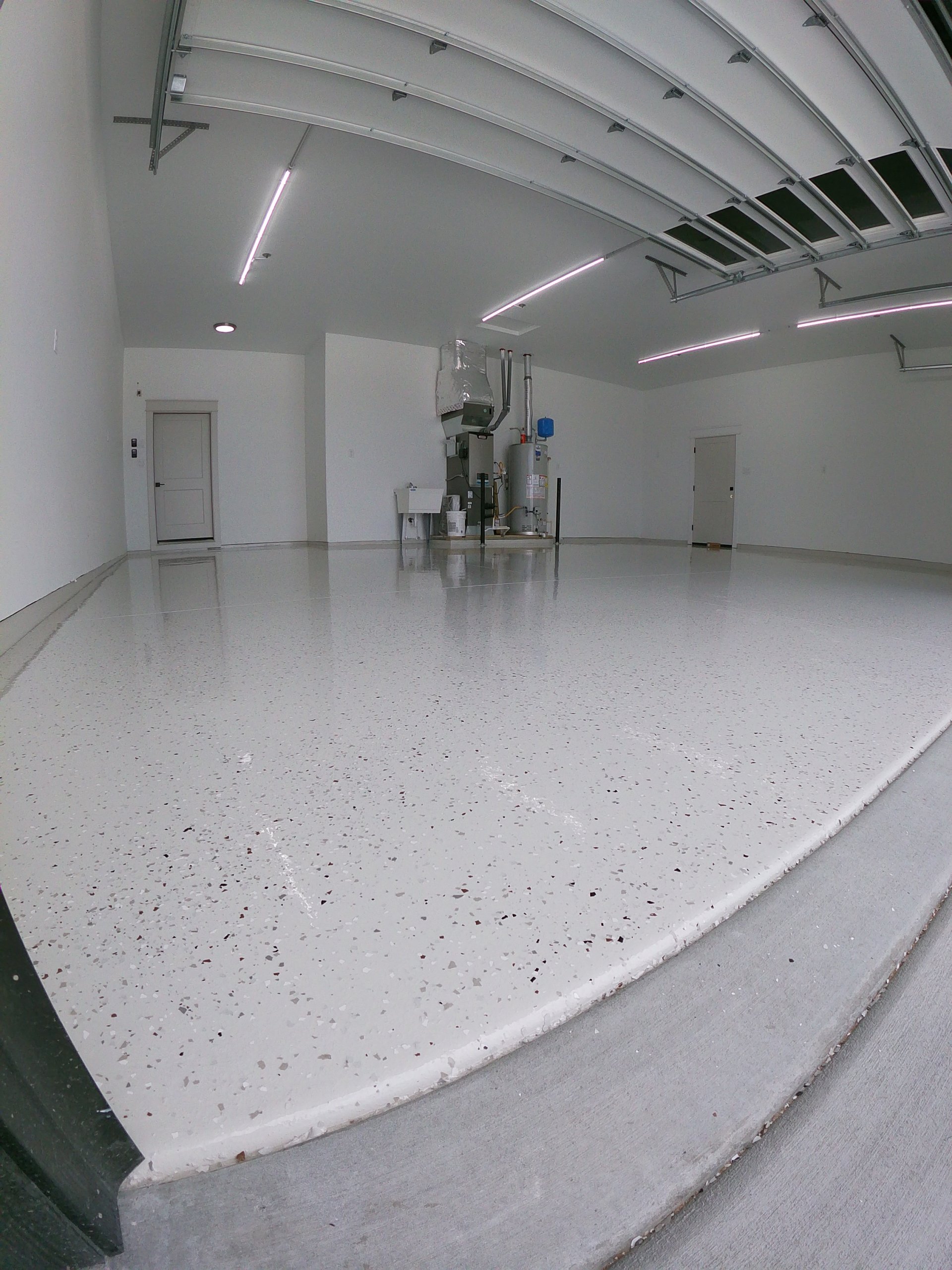 woman wearing yellow long-sleeved dress under white clouds and blue sky during daytime