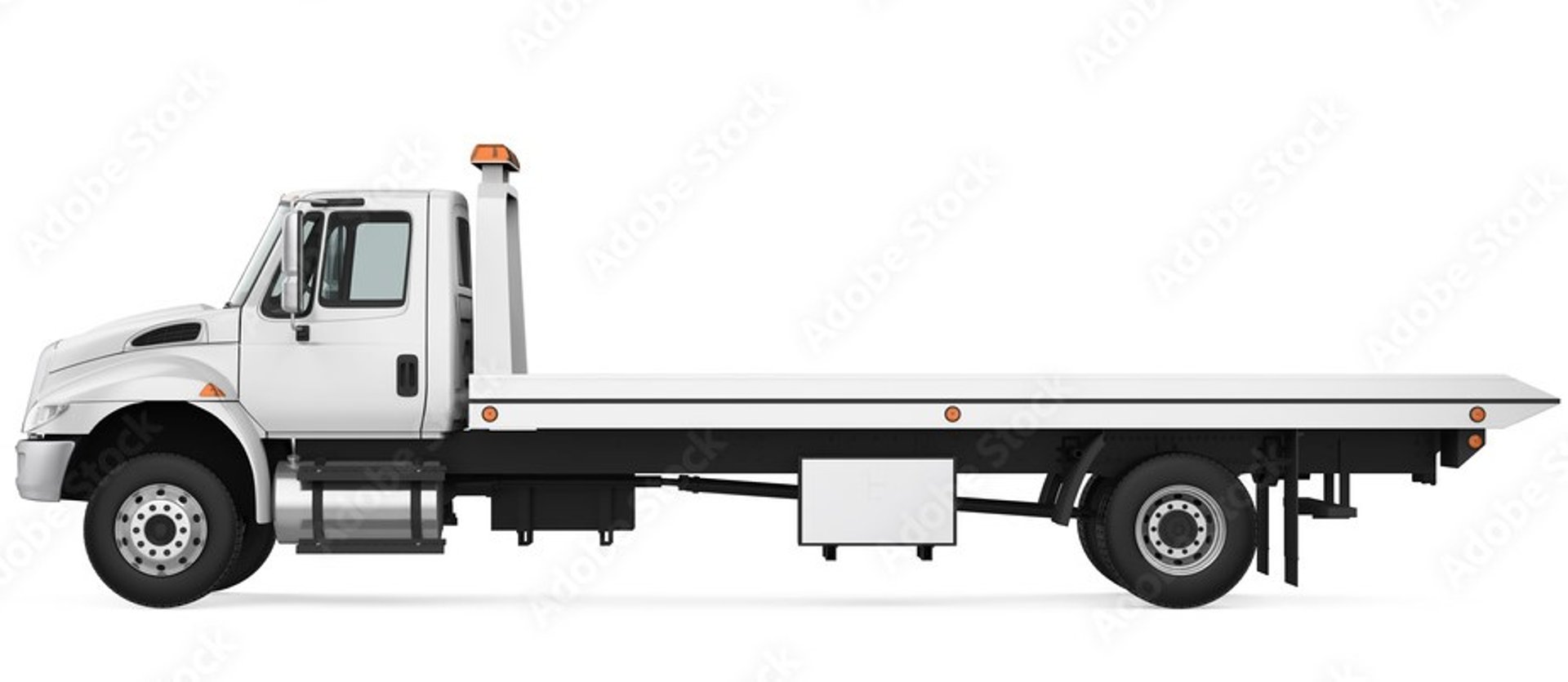 A yellow specialized truck on a grassy field.