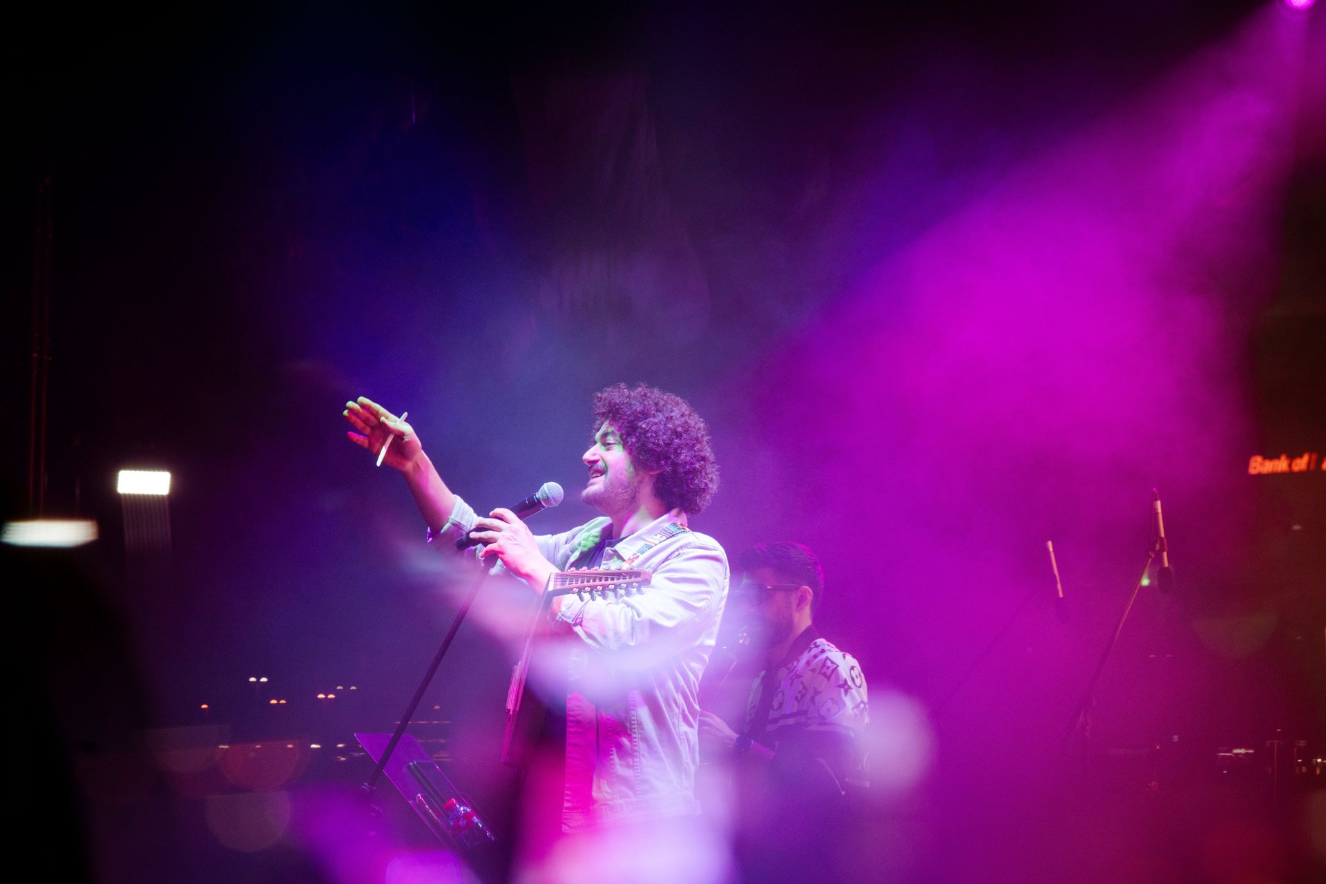 woman wearing yellow long-sleeved dress under white clouds and blue sky during daytime