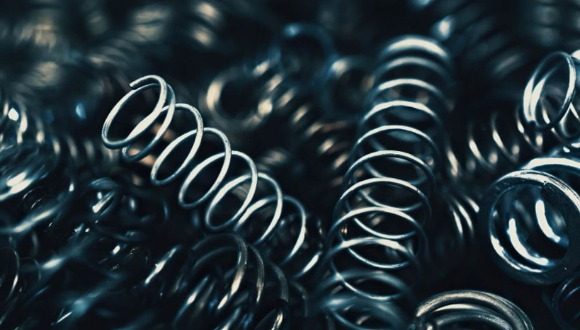 gray and black shock absorber close-up photography