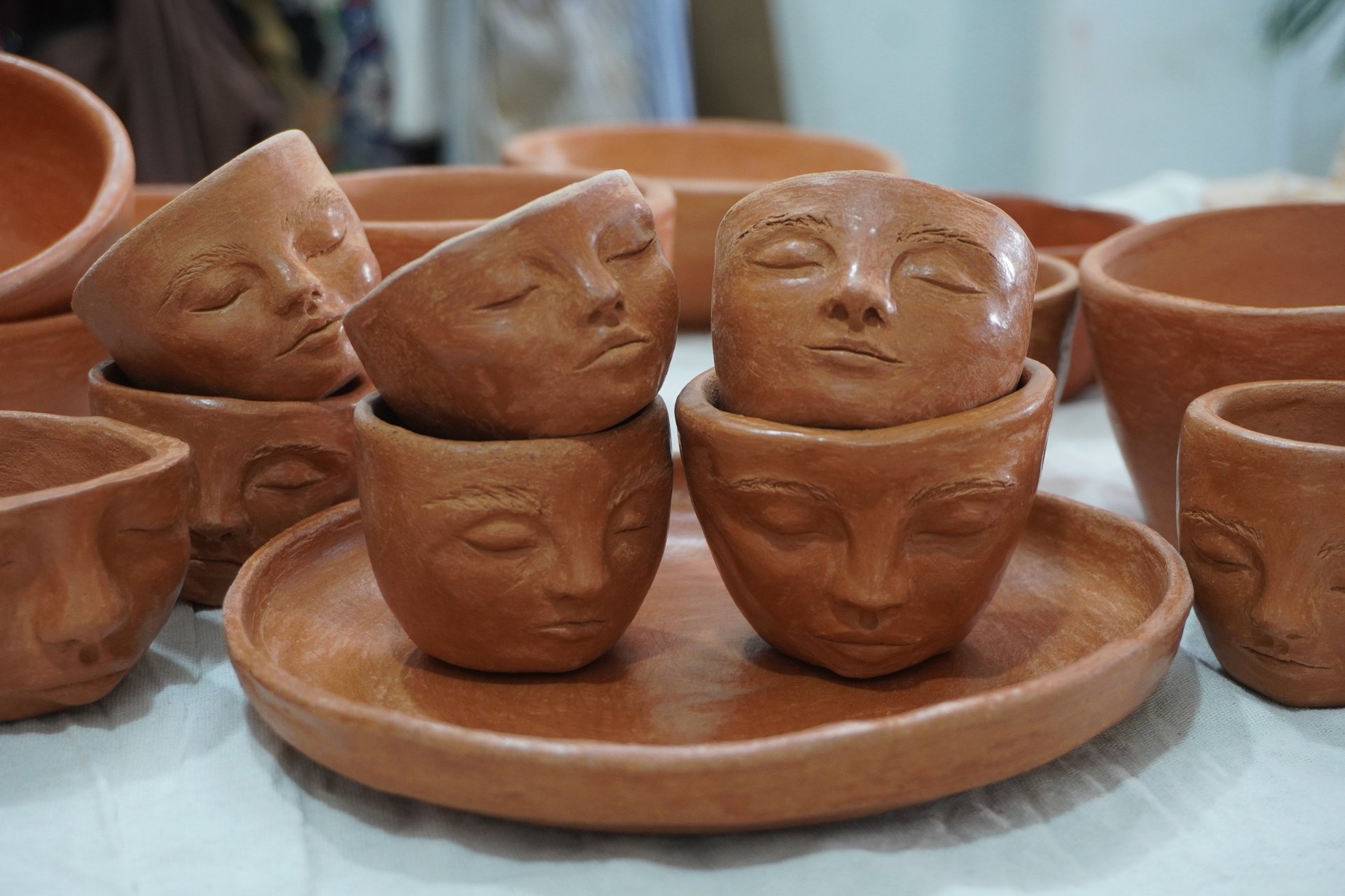an abstract photo of a curved building with a blue sky in the background
