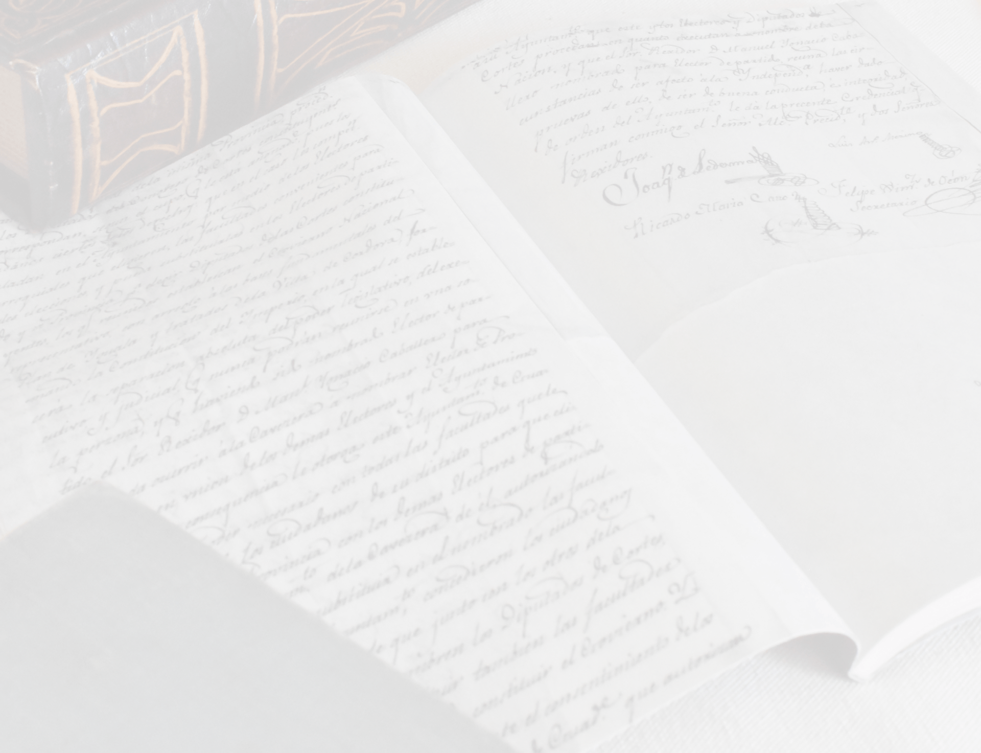 an abstract photo of a curved building with a blue sky in the background