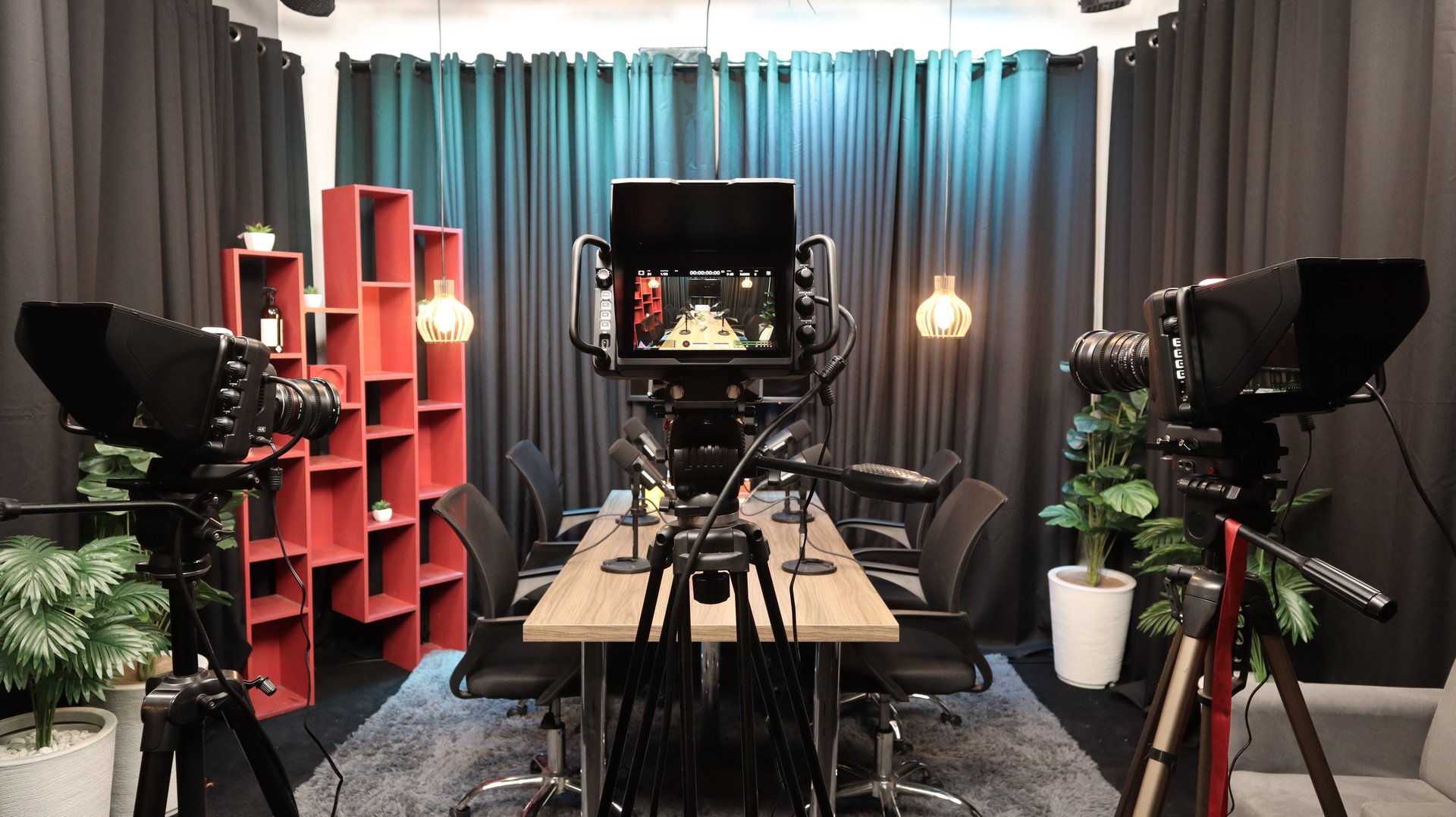 an abstract photo of a curved building with a blue sky in the background