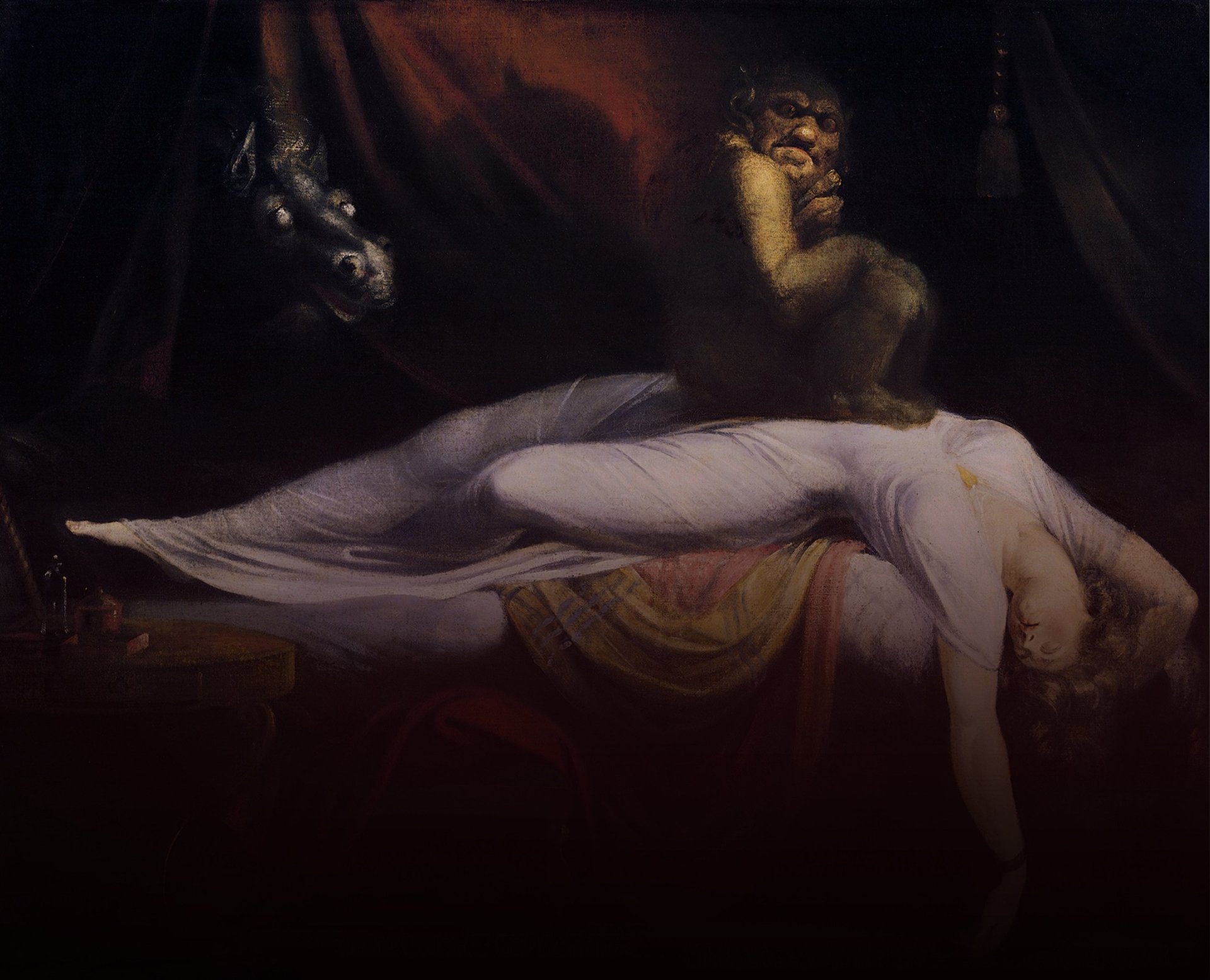 person wearing grey knit sweater