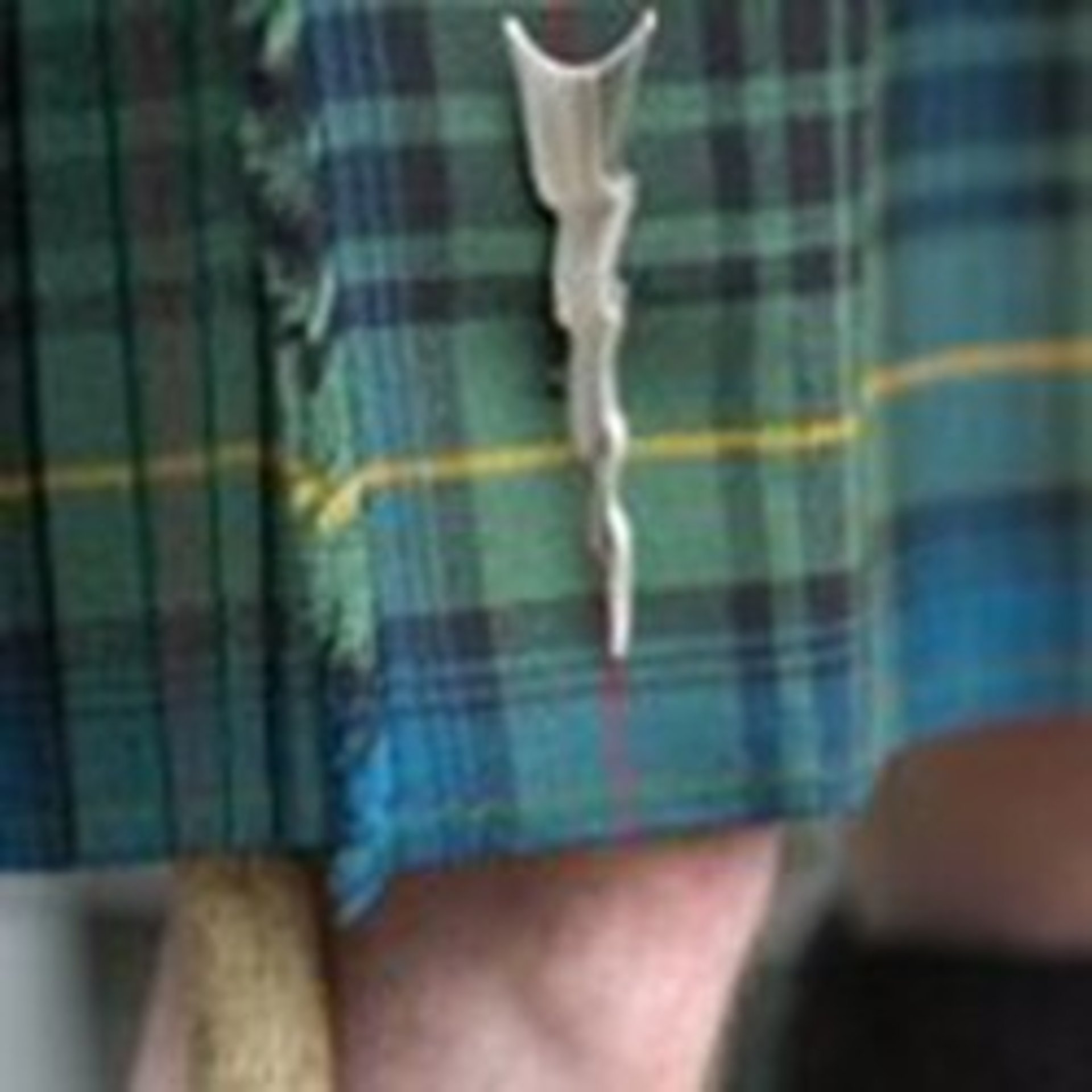 Gaz profile photo wearing a kilt.