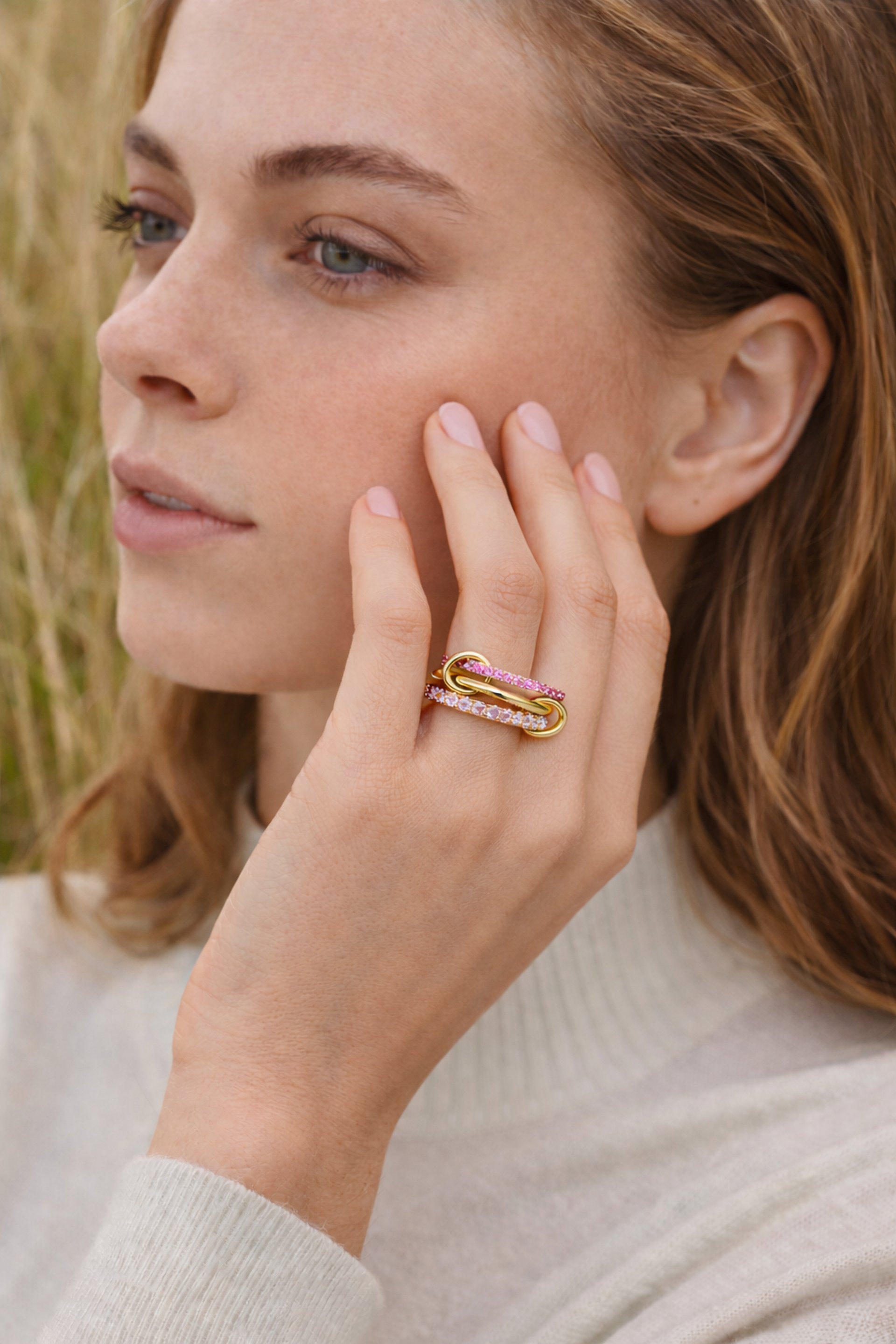 woman holding dried flower