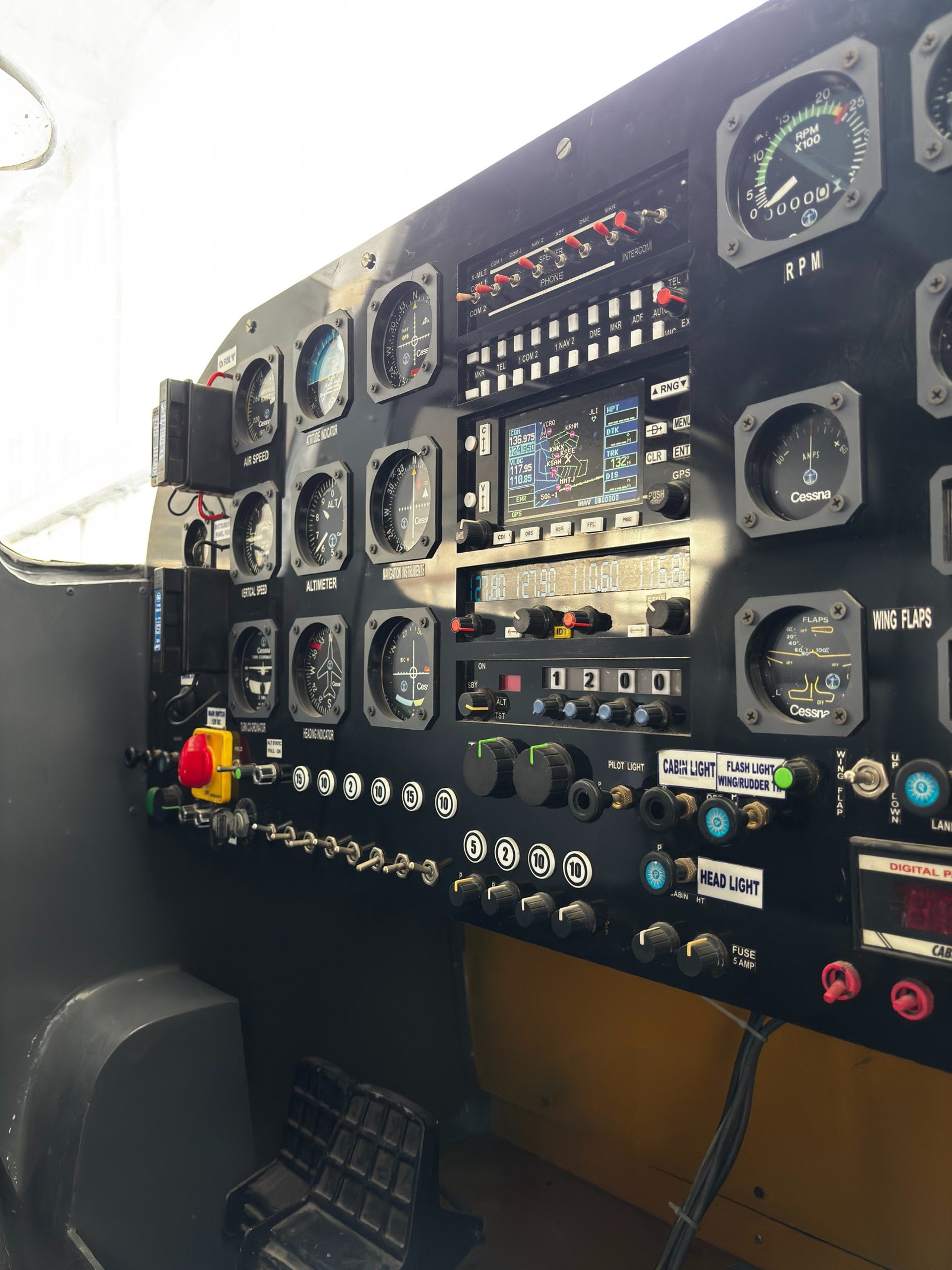 a view of the sun through an airplane window