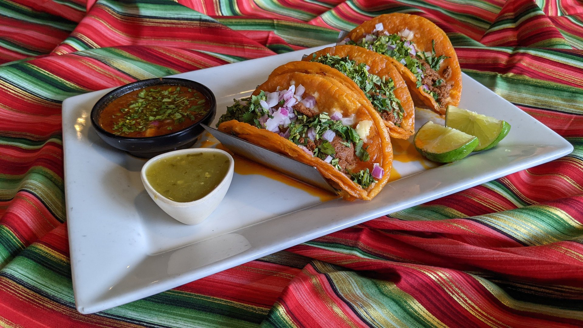 brown and green food on white ceramic plate